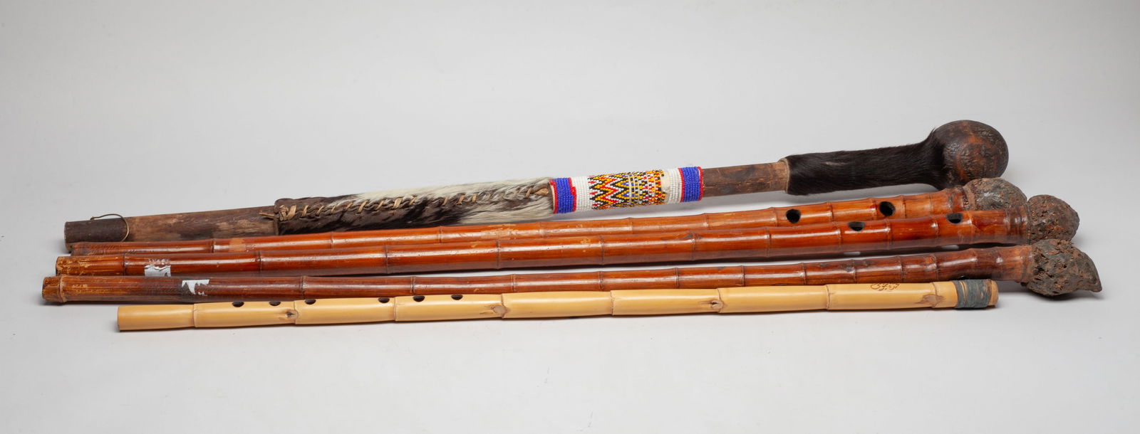 Set Vintage Rattan & Wood Canes: Set of five vintage rattan and wood canes. Approx. 32.5 inch (longest).