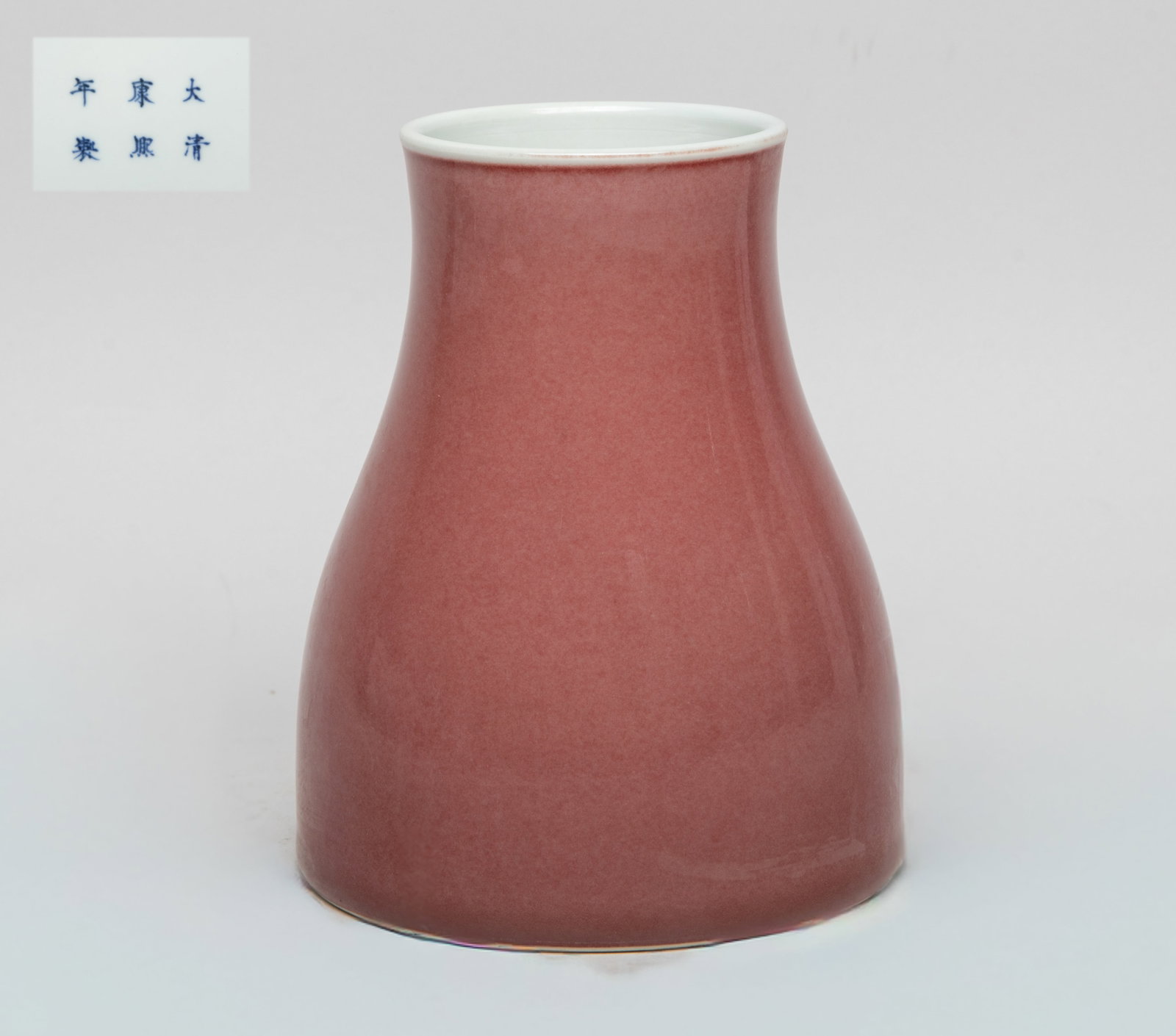 Estate Chinese Red Glazed Porcelain Vase: The vase exterior applied with soft red glaze, the bottom marked with six characters. Approx. 5.5*4.5 inch.