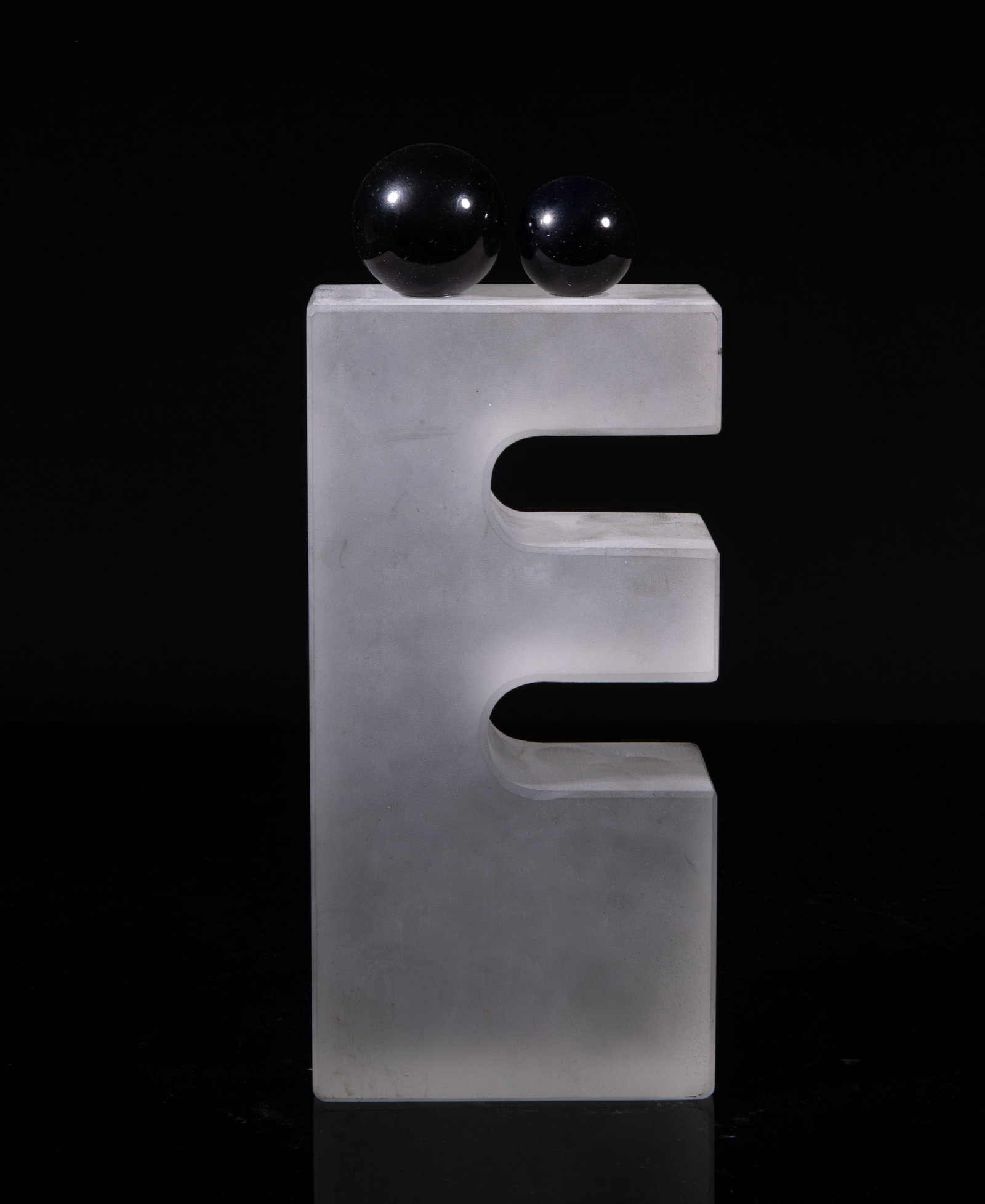 Vintage Art Decor Glass House Sculpture: Contemporary art style glass decor sculpture of letter E shape, with two balls on the top. Approx. 9.2*3.9*1.9 inch. The Estate of the W Hollywood, 2020.