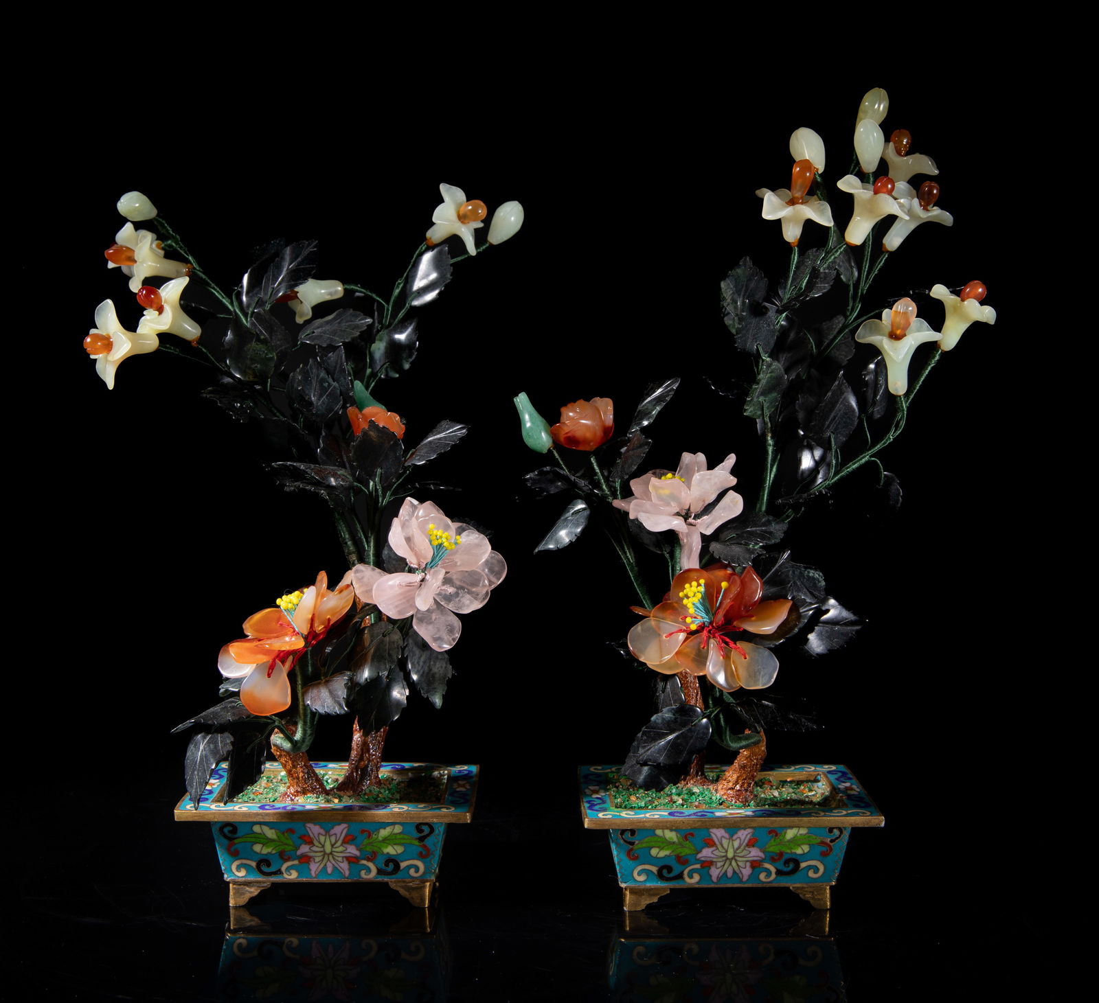 Two Vintage Chinese Cloisonne, Jade, Agate Bonsai: Two Chinese artificial bonsai, with agate, rose quartz and gemstone carved blooms and buds, and spinach jade carved leaves, the cloisonne pots enameled with lotus scrolls on turquoise blue ground. App