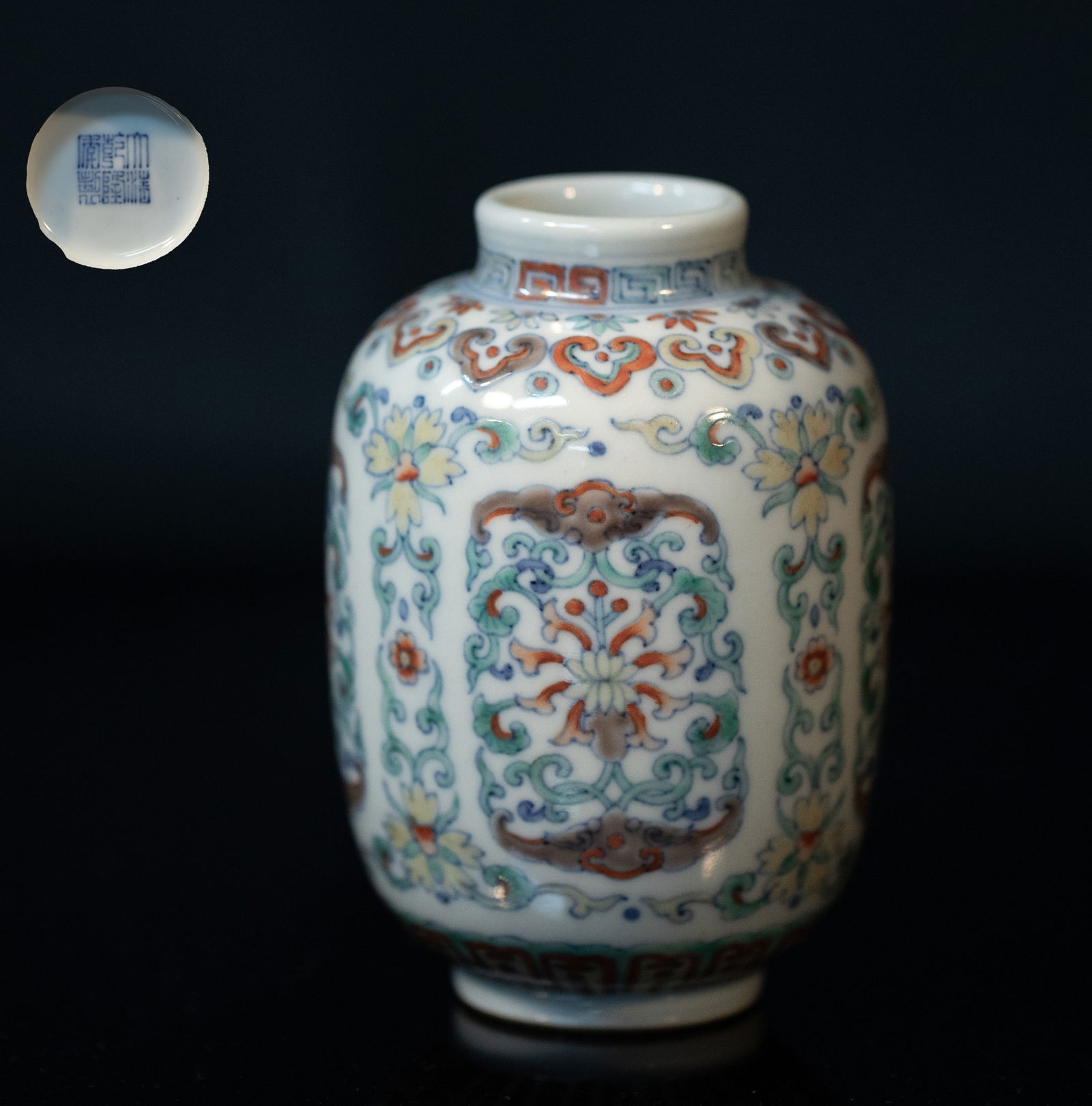 Chinese Export Douchai Porcelain Jar: Of ovoid form, decorated with stylized lotus foliage and bays, between bands of ruyi heads and lappets, the bottom inscribed with a six-character mark. Approx. 4.5*3.1 inch. The Estate of the Store Cl