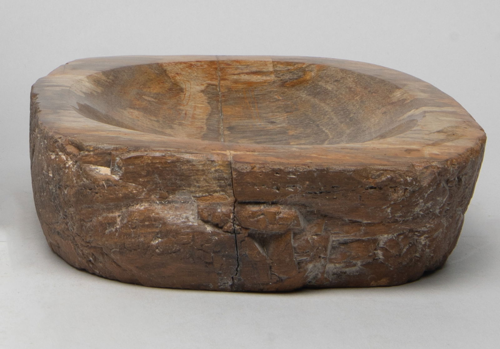 Vintage Petrified Wood Bowl: Collectible petrified wood carved shallow bowl, the interior finely smoothed and polished. Cracks. Approx. 5.7*5.2*1.7 inch.