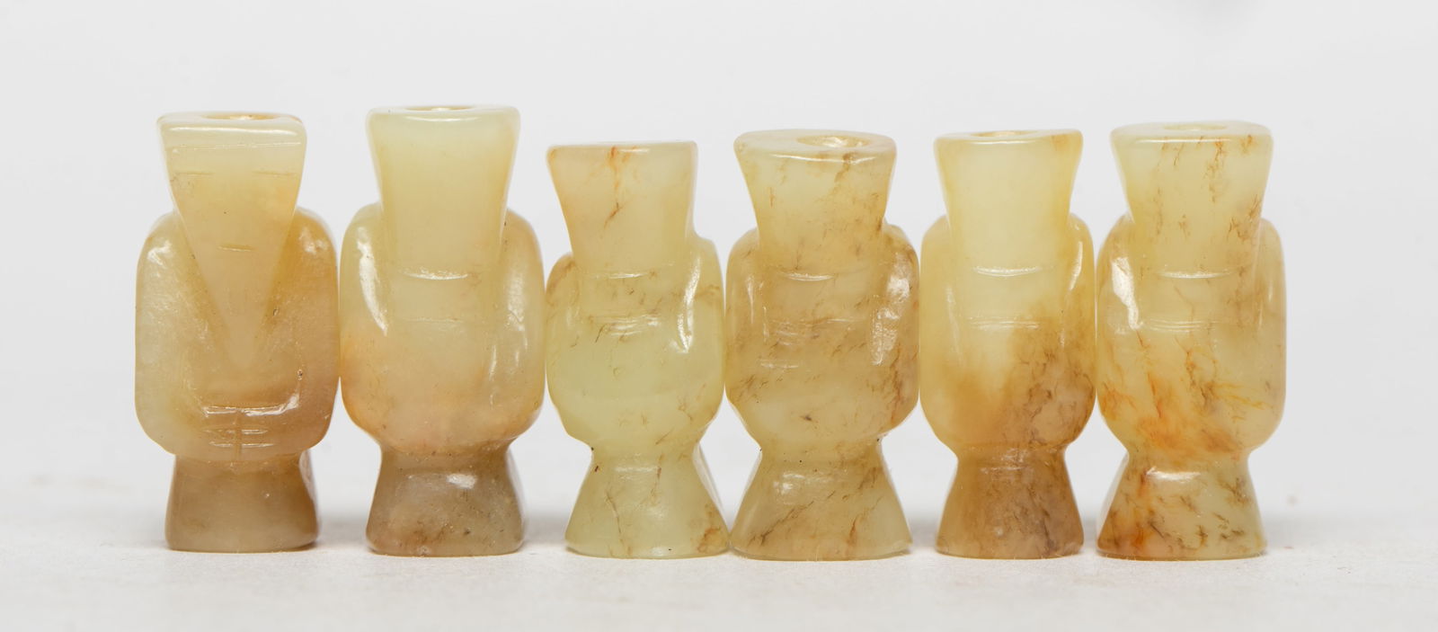 Set Chinese Export Jade Beads: Set of six Chinese russet jade beads carved of standing figure form. Approx. 0.92*0.42*0.36 inch (largest)