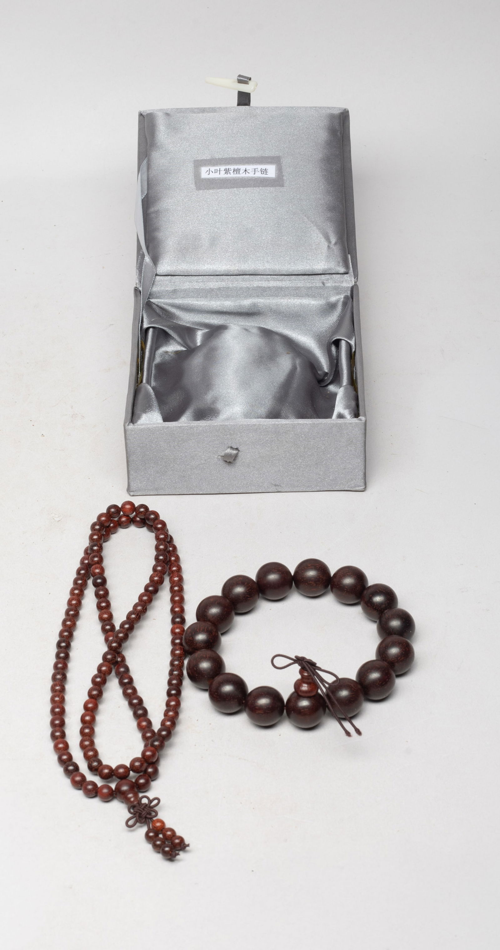 Chinese Export Wood Prayer Beads: Including a string of Chinese wood carved prayer beads, and a bead necklace, with box. Approx. 25 inch L (necklace size).