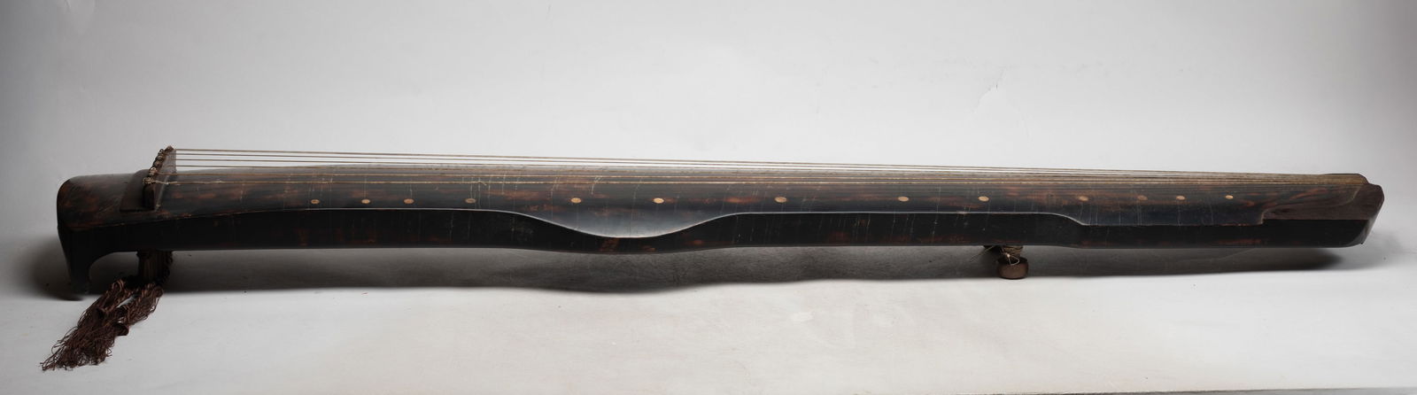 Estate Chinese Lacquer Guqin: Collectible Chinese lacquer guqin, the bottom incised with inscription. Approx. 47.5*8*4 inch.