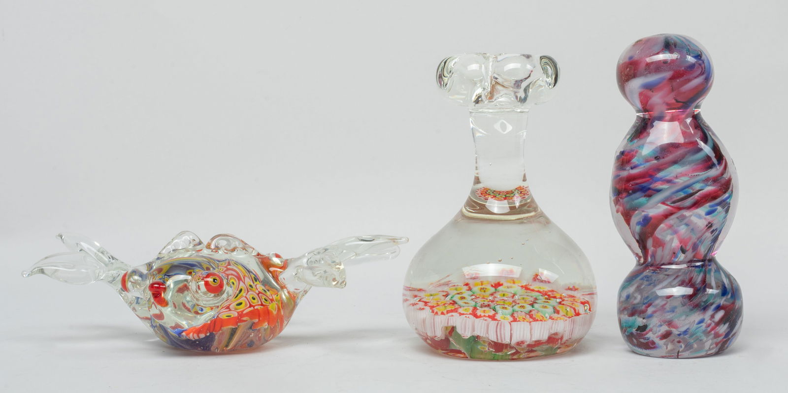 Set Vintage Millefiori Glass Sculptures: Set of three vintage Millefiori glass sculptures, wherein one worked of goldfish form. Approx. 5.6*3.5*1.75 inch (largest).