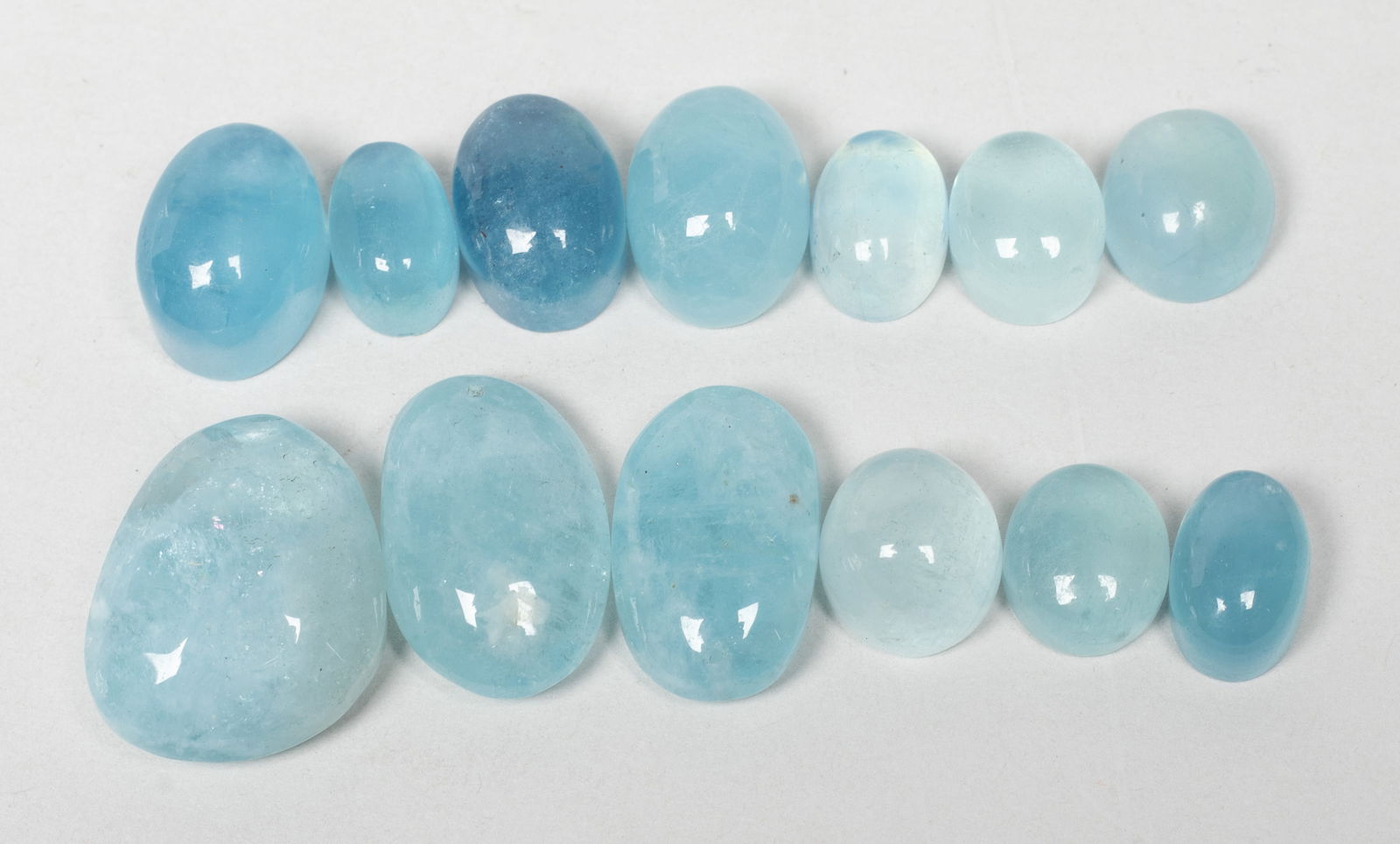 Set High Quality Aquamarine Cut Stones: Large set of high quality aquamarine cut stone pieces. Approx. 50 gram (total weight), 1*0.8*0.44 inch (largest).