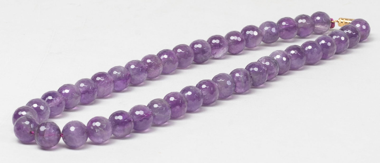 High Quality Cut Amethyst Necklace: High quality amethyst cut bead necklace. Approx. 16 inch L.