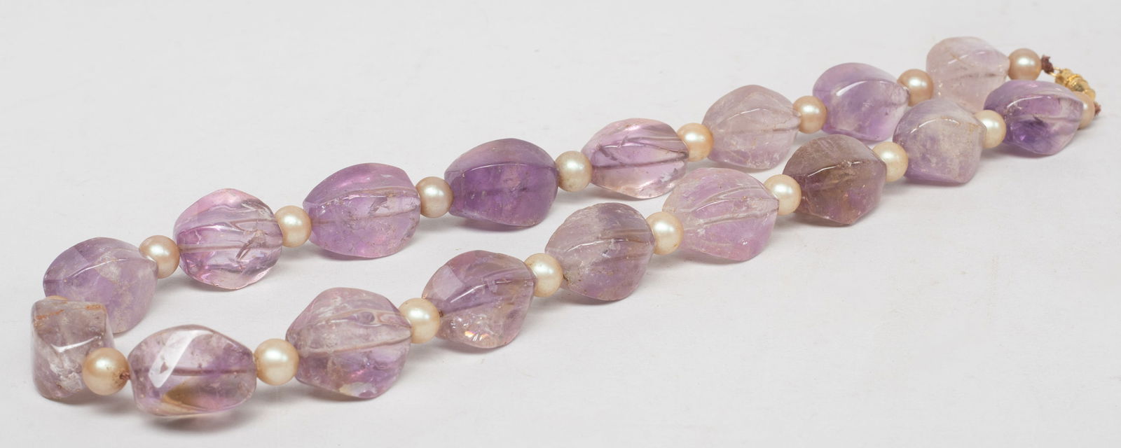 Vintage Chinese Cut Clear Amethyst Necklace: Vintage Chinese clear amethyst nugget bead and pearl-like bead necklace. Approx. 20 inch L. The Estate of the Store Closed Sale, DTLA, 2020.