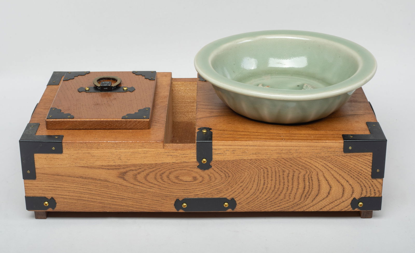 Rare Chinese Longquan Porcelain Washer: The washer interior centre carved in raised relief with a pair of fish, overall covered with bubbled celadon glaze, with a large wood stand. Approx. 5.7*1.8 inch (washer size). The Estate of the Store