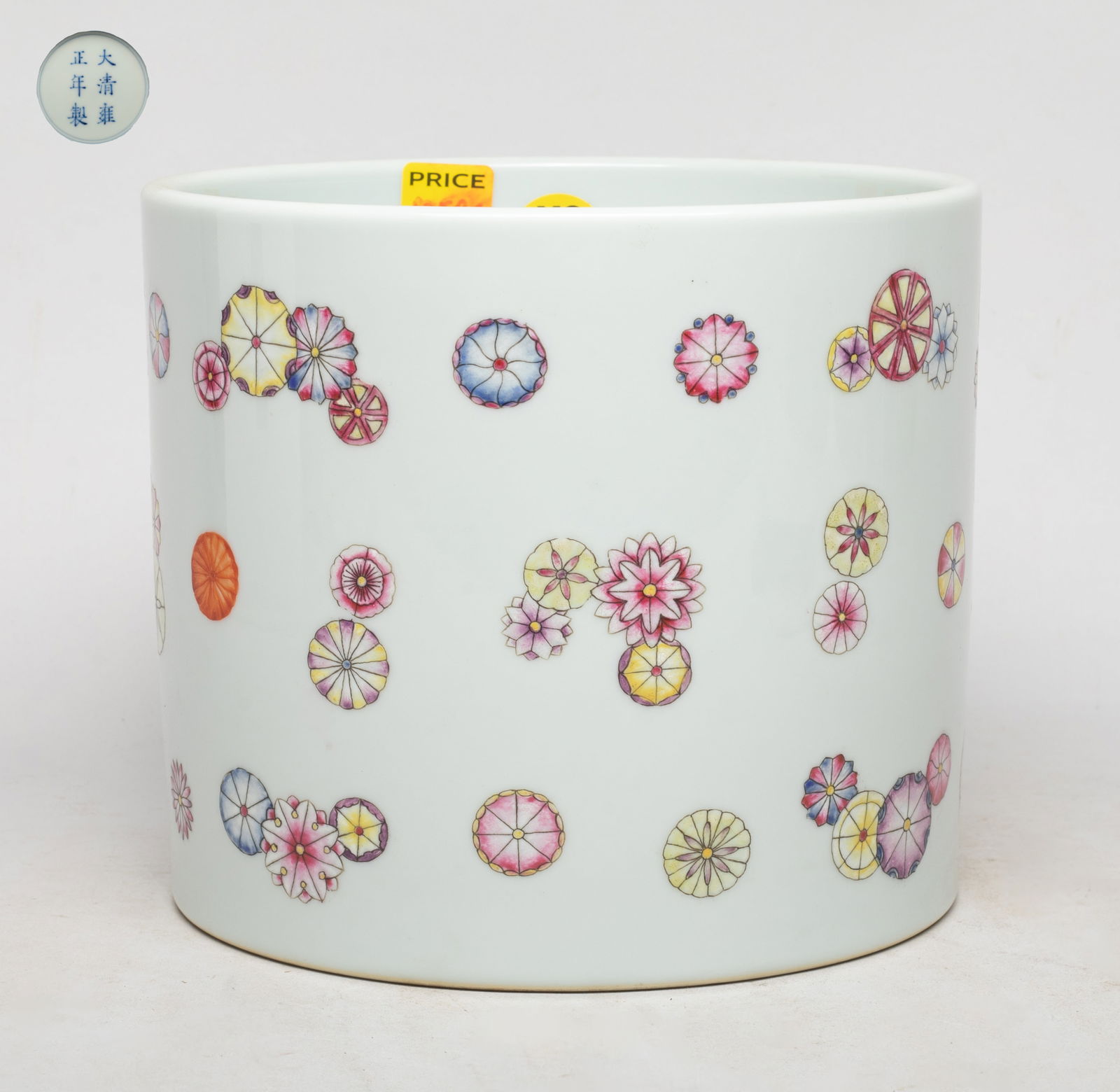 Estate Chinese Famille Rose Porcelain Brush Pot: Of cylindrical shape, the exterior enameled and painted with stylized flowers, the bottom marked with six characters enclosed in double circles. Approx. 7.5*6.5 inch. The Estate of S Pasadena, CA, 202
