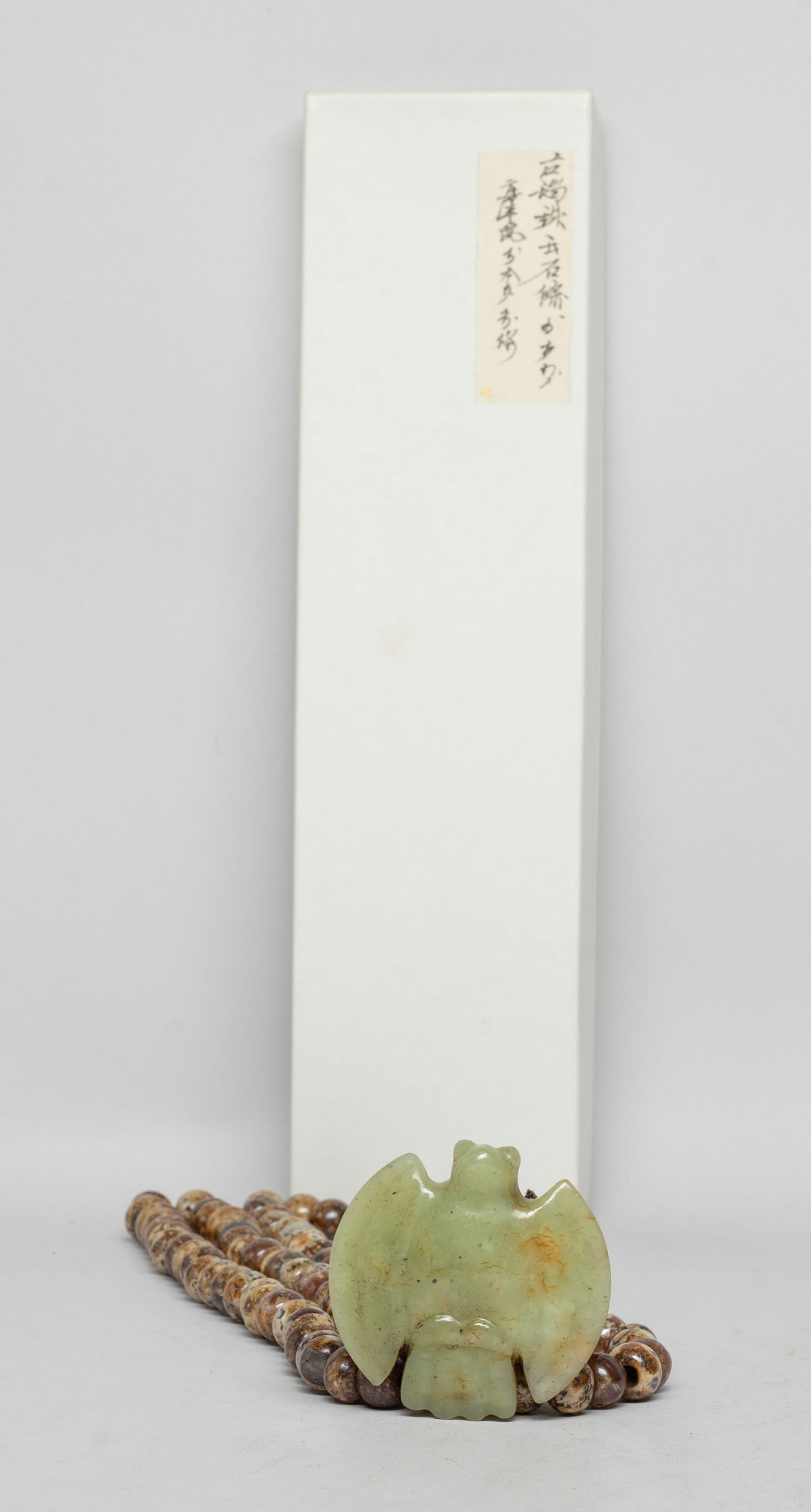 Rare Chinese Agate Beads Necklace w/ Jade: Long Chinese agate bead necklace, with a jade pendant carved of archaic bird form, with box. Approx. 2.25*2.2 inch (jade size).