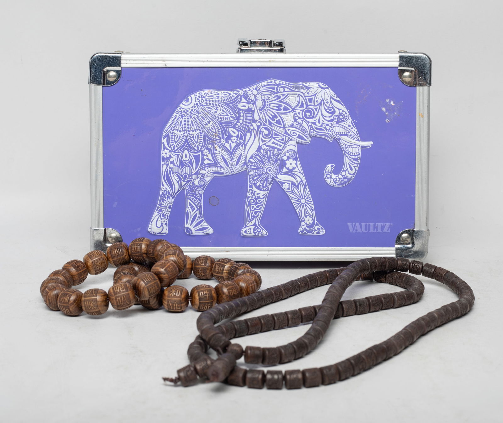Set Chinese/ South Asian Agarwood Prayer Beads: Including a long string of agarwood prayer beads, each incised with a dragon, and two strings of agarwood prayer beads carved Buddhist texts, with box. Approx. 90 gram (total bead weight), 0.58 inch