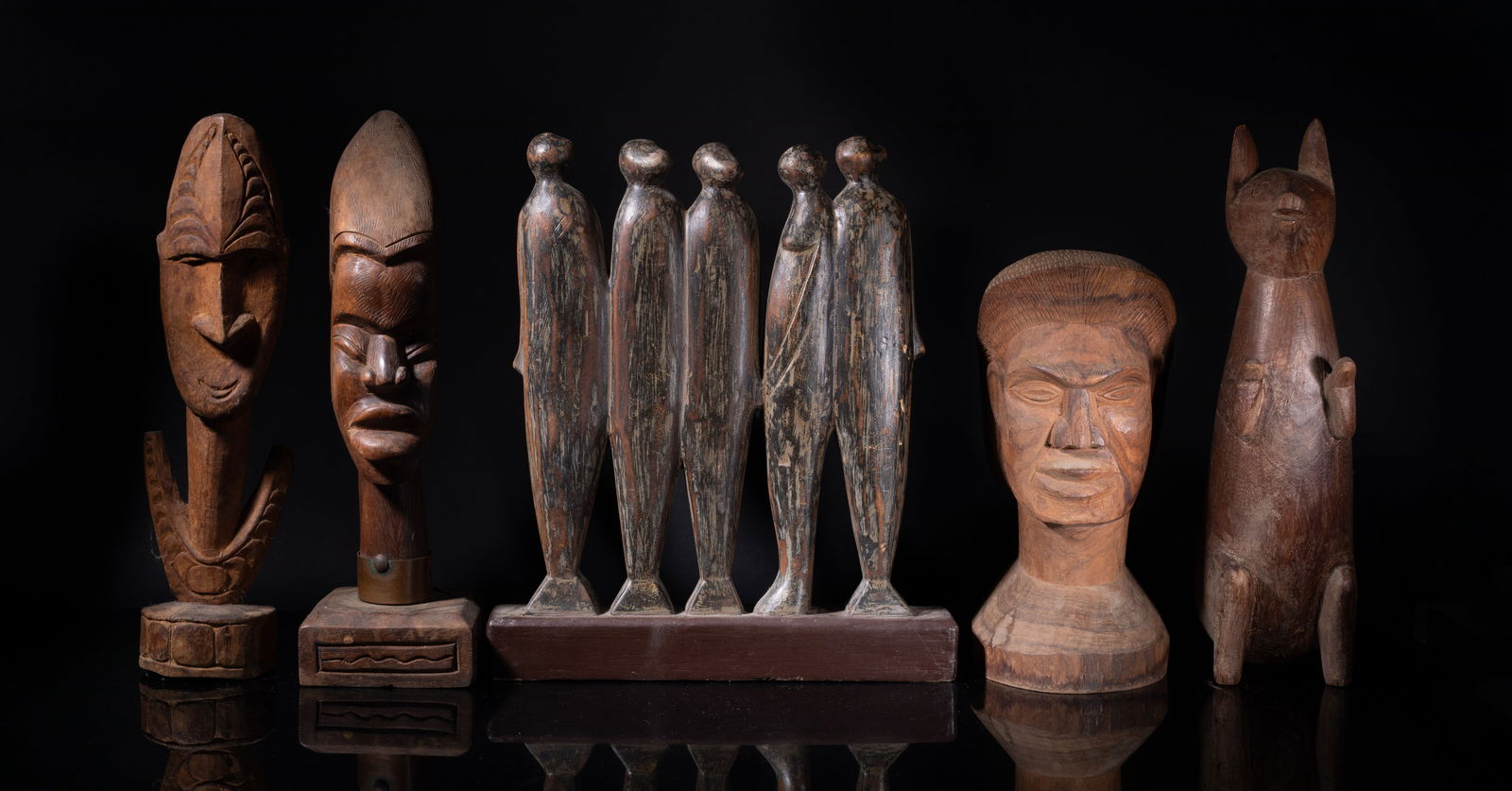 Estate Set Vintage African Wood Carvings: Set of five vintage African wood sculptures carved of abstract figure or beast form. Size varies.