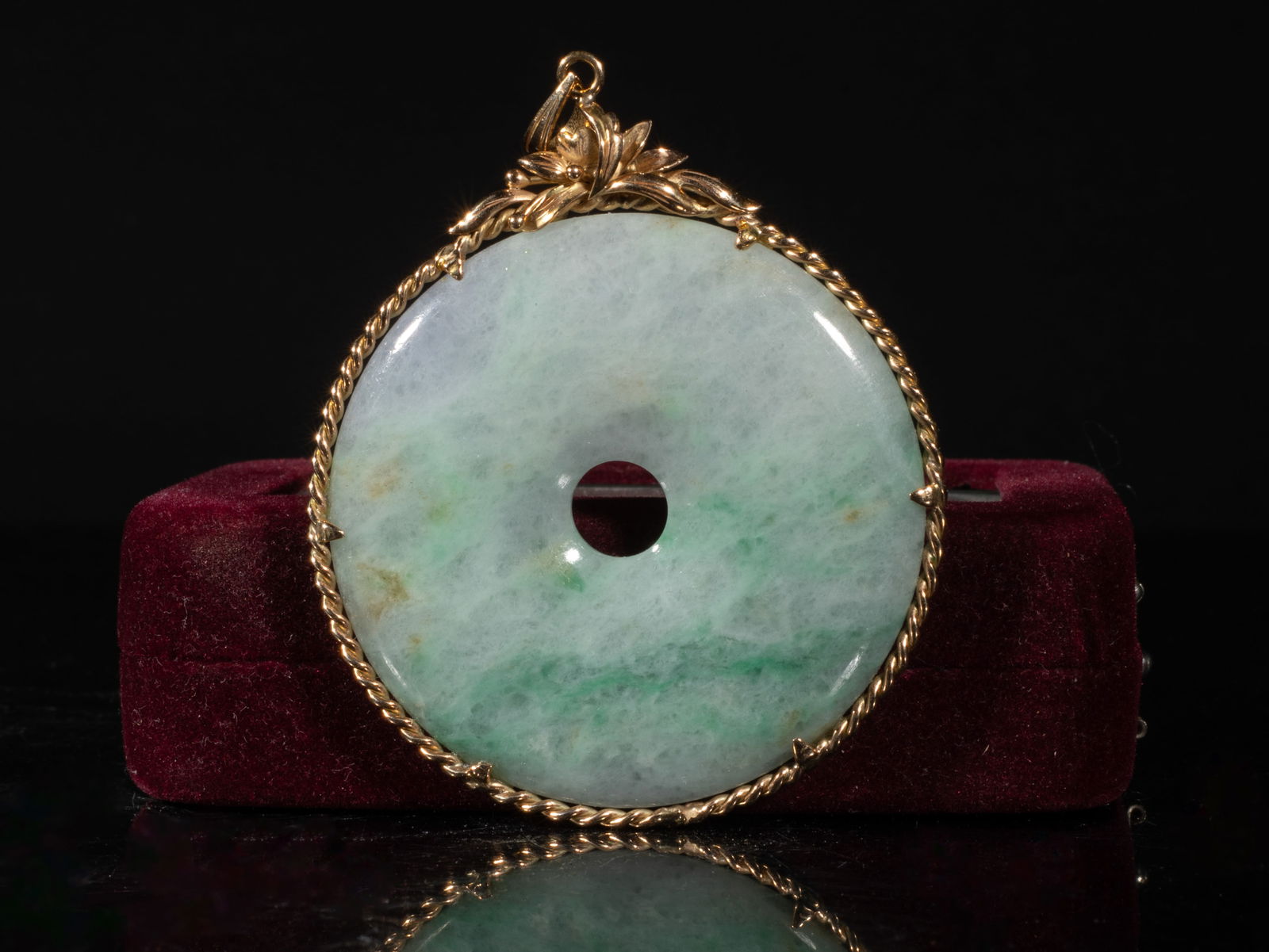 Chinese 14K Gold Jade Jadeite Pendant: Chinese jade jadeite pendant of disc shape, with gold frame and bail, marked 14K on the bail, with box. Approx. 36 gram, 2.5*2.05 inch (w/o box).
