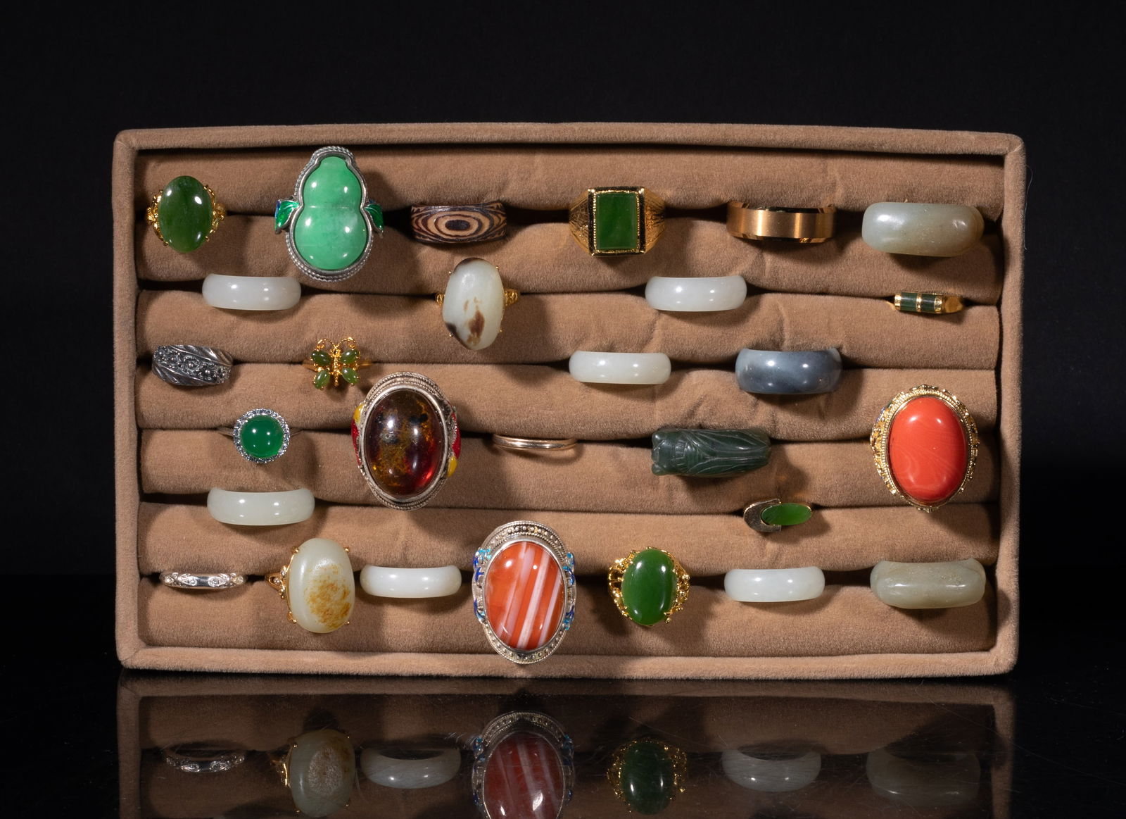 Estate Set Chinese Export Rings: Large set of Chinese designed rings, some rings inlaid with stone, some carved of stone, with a tray. Size varies.
