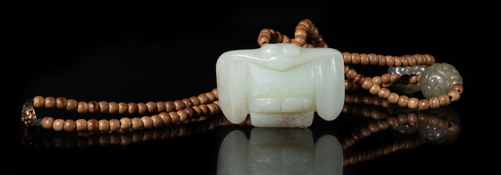 Vintage Chinese Export Agarwood Necklace w/ Jade: Chinese agarwood bead necklace, with two jade beads carved with scrolls and a jade pendant carved of archaistic bird form. Approx. 24 inch L.