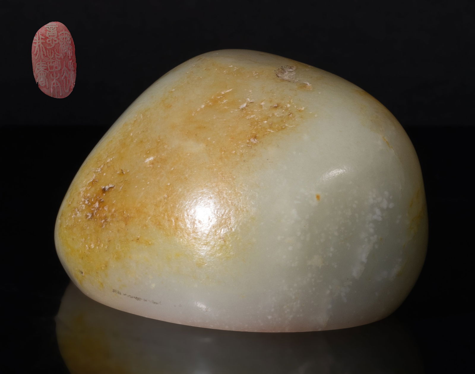 Estate Chinese Russet Jade Seal: Collectible Chinese russet jade seal, of irregular shape, the surface finely smoothed. Approx. 3.33*2.05*1.9 inch.