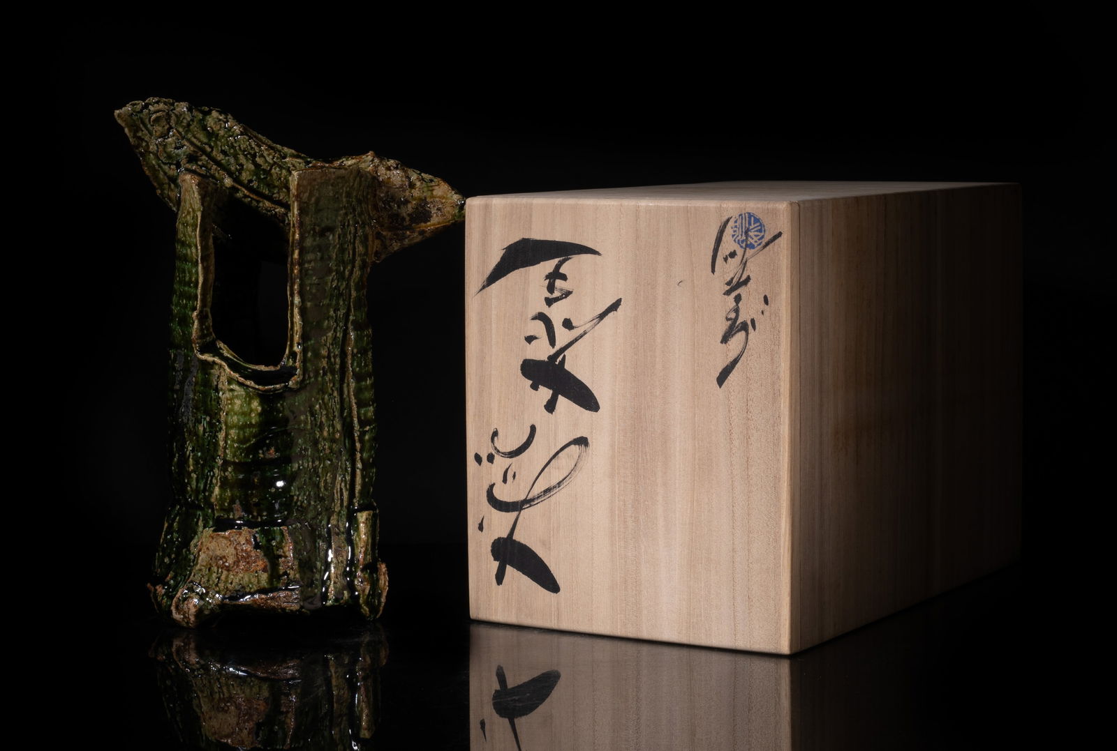 Vintage Japanese Designed Stoneware Vase: Vintage special form Japanese designed stoneware vase, covered with mottled dark green glaze, with box. Approx. 11*7.7*5.2 inch (w/o box).