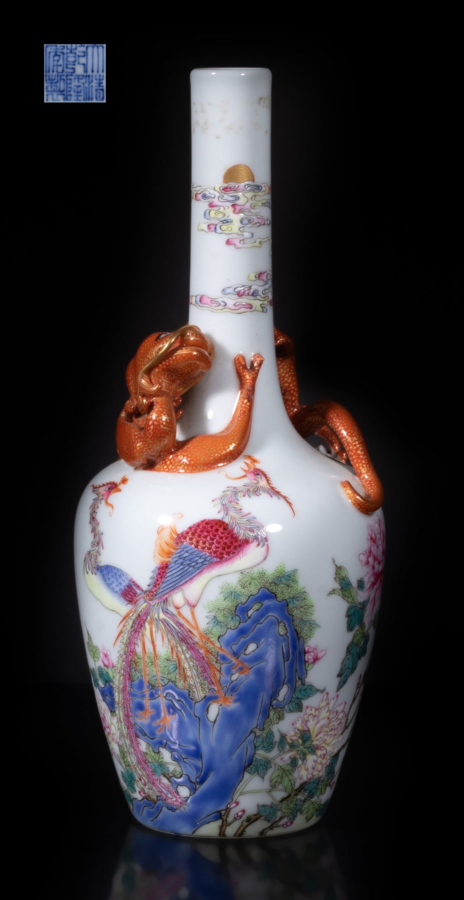 Estate Chinese Famille Rose Porcelain Cabinet Vase: The ovoid body with a tall slender neck, the exterior enameled with a pair of phoenixes amidst peony and rockery under scrolling clouds, with a raised copper-red glazed dragon around the neck, the