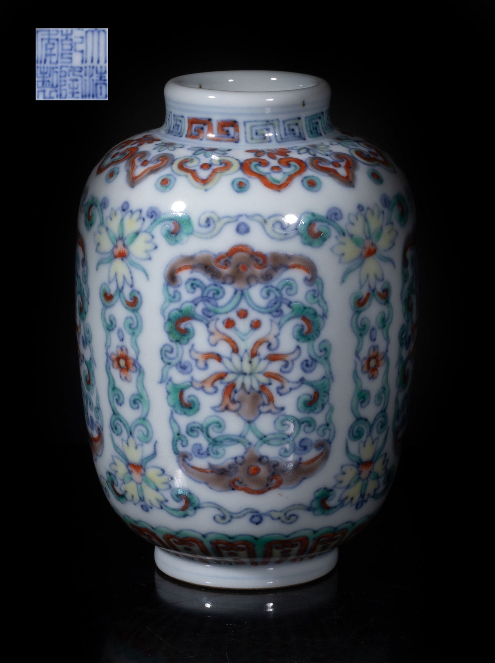 Rare Chinese Douchait Porcelain Vase: The ovoid body painted with lotus scrolls and bats forming in rectangular shape, separated by foliate scrolls, between bands of ruyi heads and lappets, the bottom with a six-character mark. Approx.