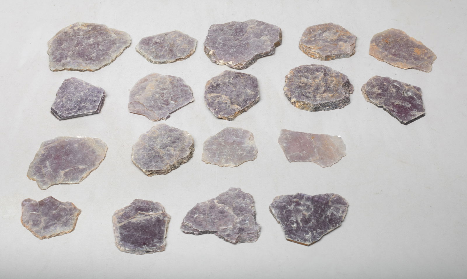 Collectible Set Lepidolite Crystal Slabs: Large group of lepidolite crystal slabs. Size varies.
