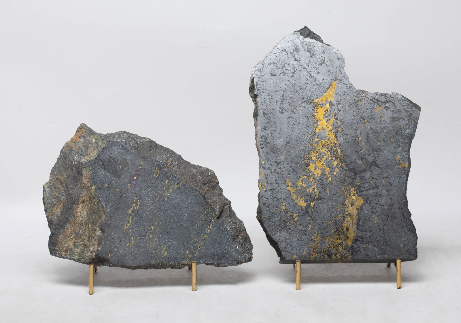 Two House Decor Pyrrhotite Slab Sculptures: Two room decor pyrrhotite slab table sculptures, with stands. Approx. 8*5.5 inch (larger w/o stand).