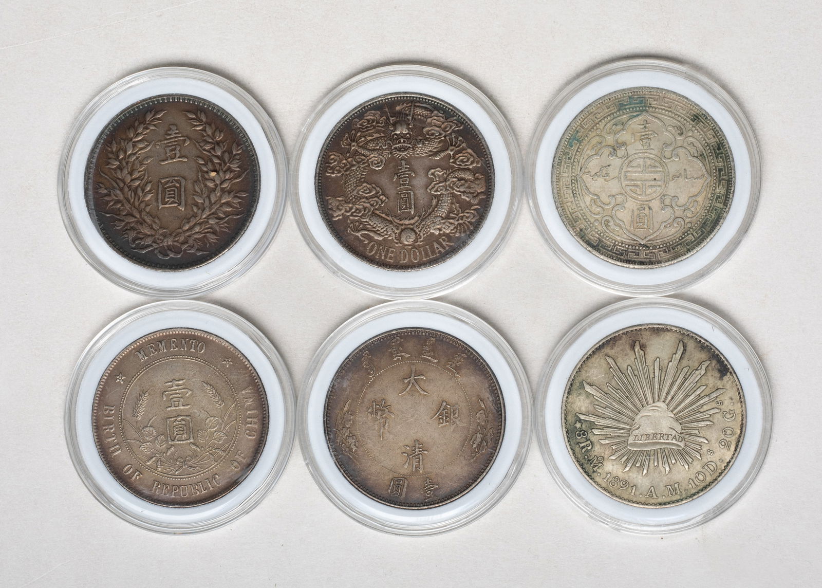 Set Chinese Export Fengshui Coins: Including five Chinese Fengshui coins and a Mexican coin, with cases. Size varies.