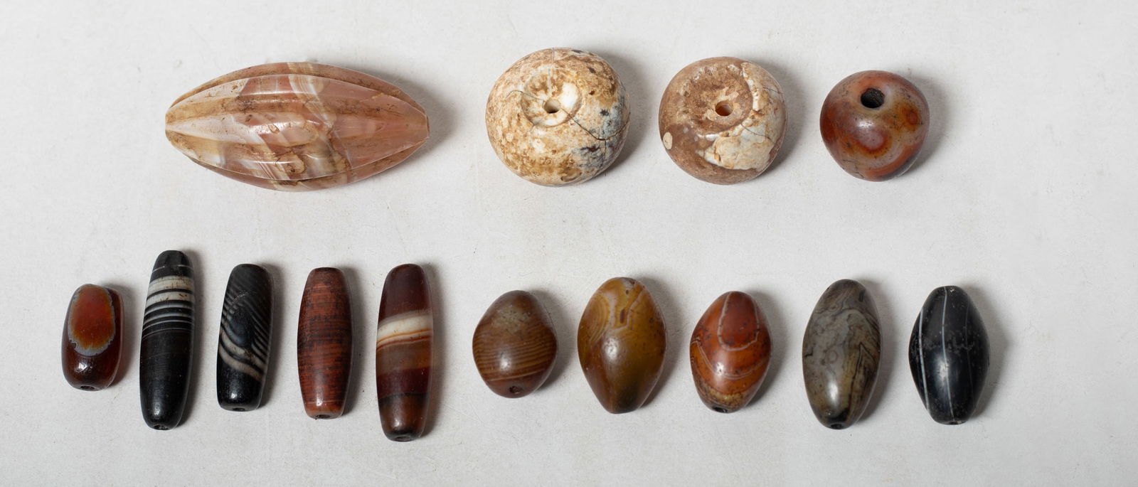 Estate Set Chinese/ Tibetan Beads: Large set of Chinese / Tibetan agate and stone beads. Approx. 2.27*1.05 inch (largest).