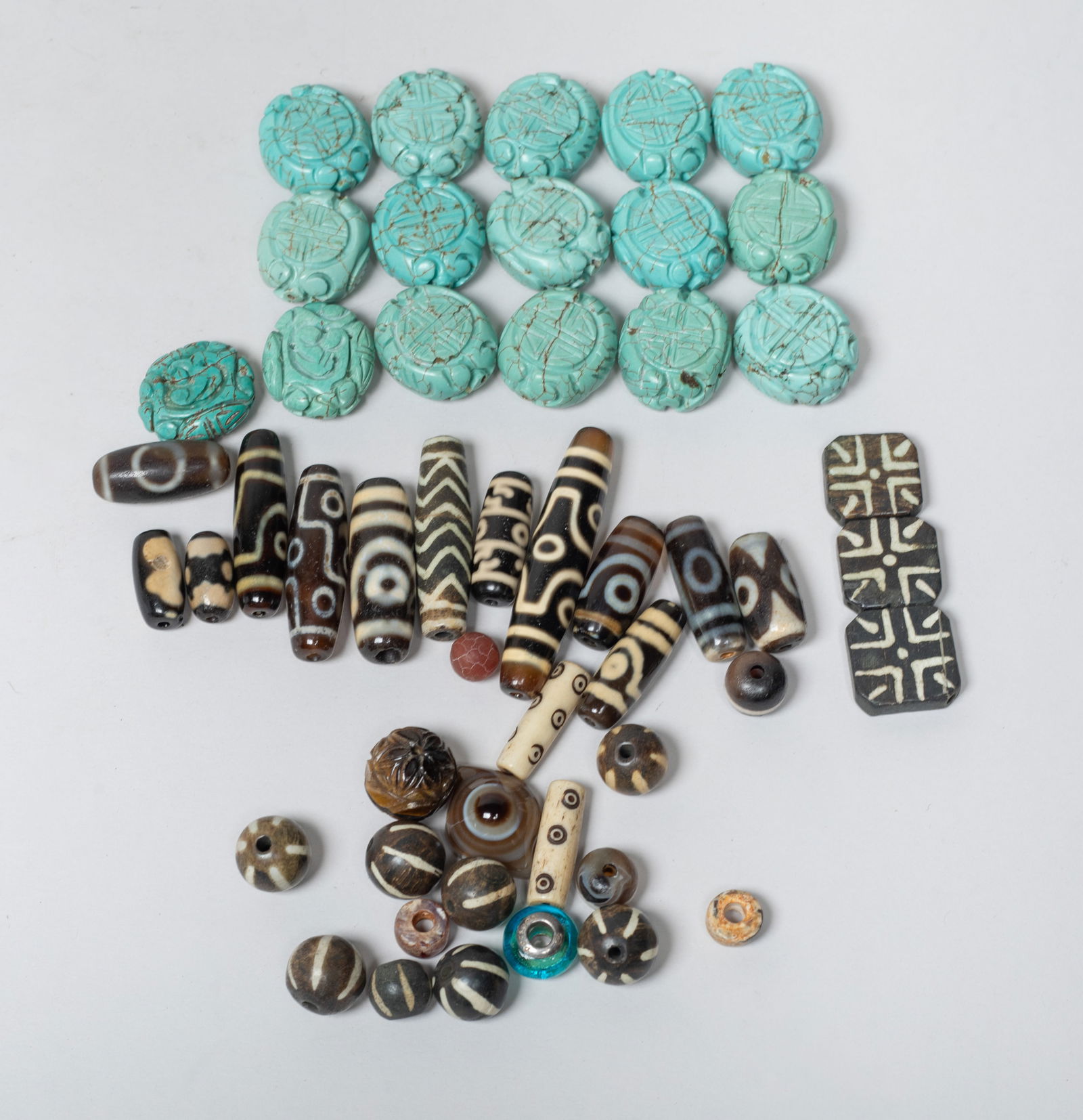 Estate Large Groups Chinese Export Beads: Large group of Chinese stone and agate carved beads. Size varies.