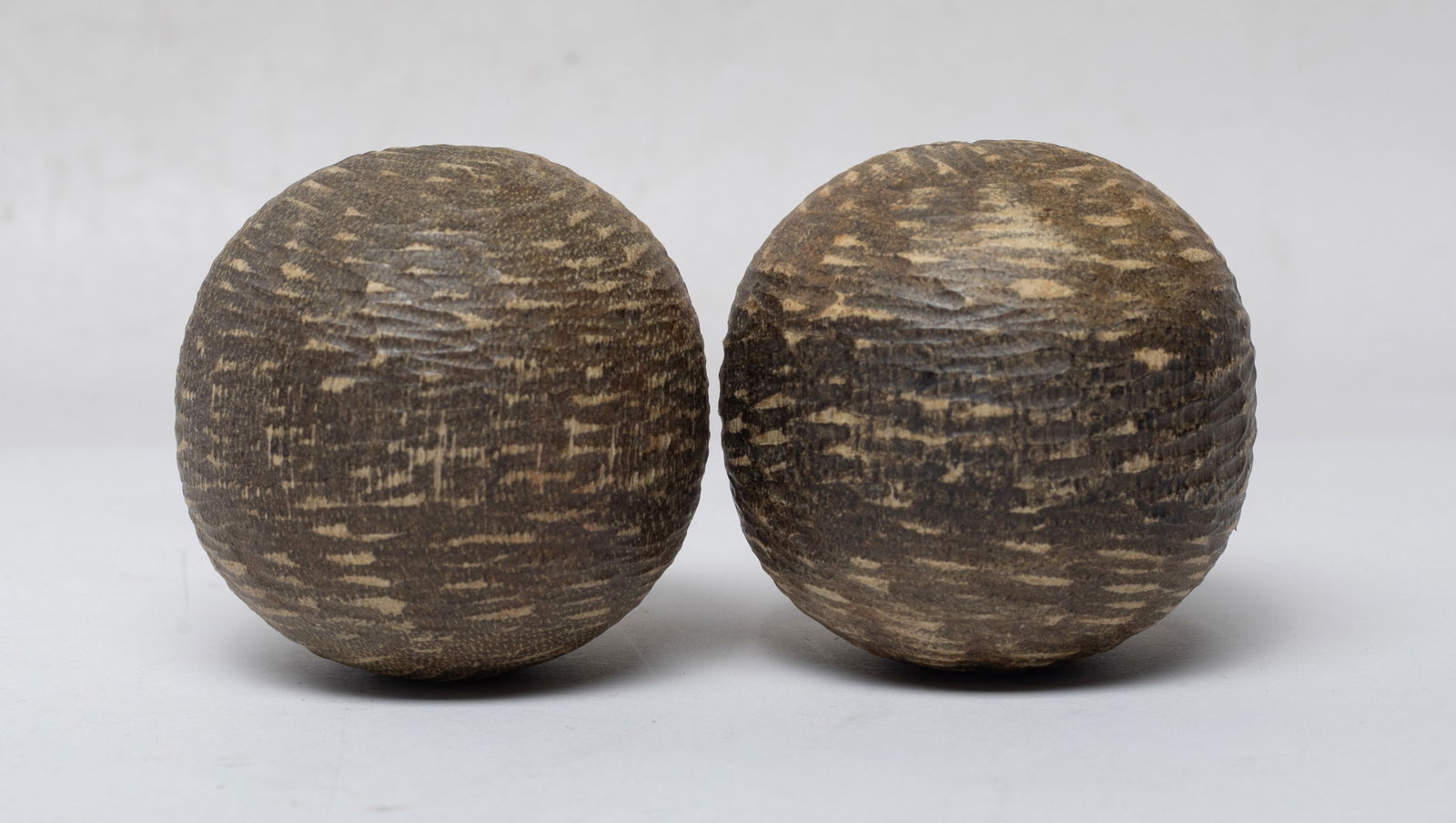 Two Chinese Export Agarwood Balls: Two Chinese agarwood carved balls. Approx. 140 gram (total weight), 2 inch D (each ball size).