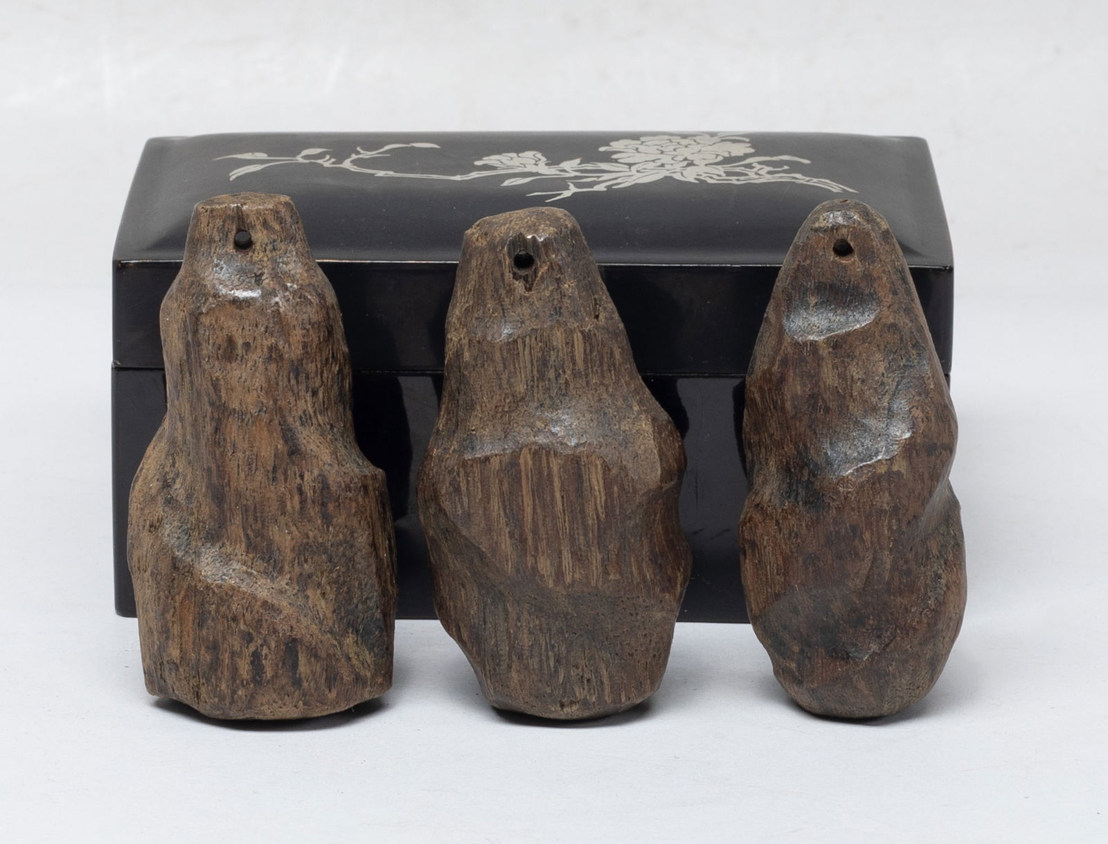 Three Chinese Export Agarwood Pendants: Set of three Chinese agarwood pendants, with box. Approx. 76 gram (total weight), 2.7*1.4*1.35 inch (largest).