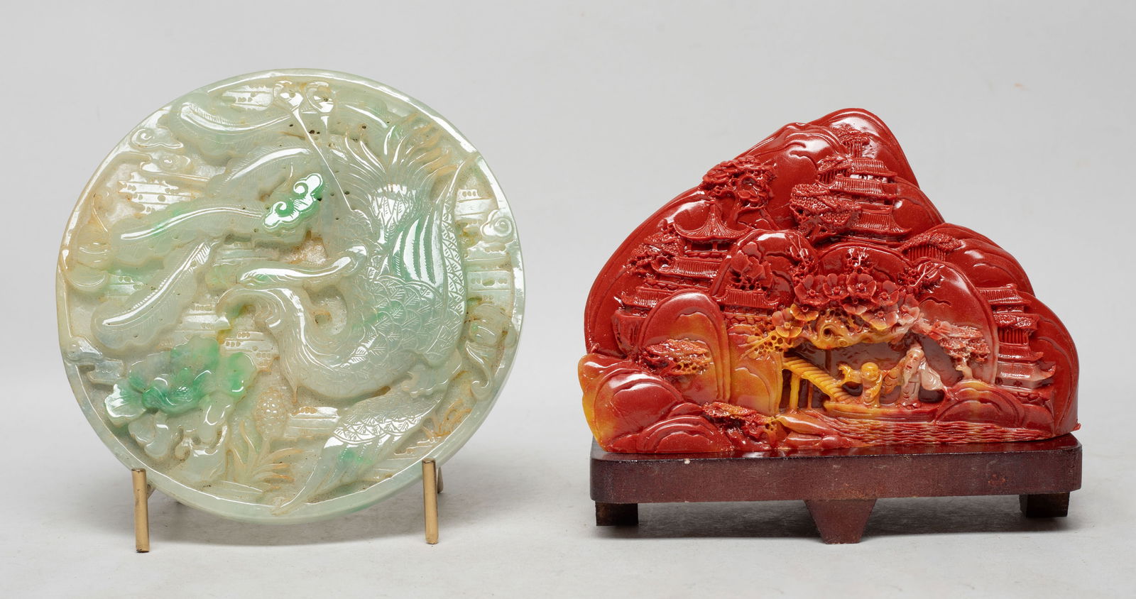 Estate Chinese Export Colored Table Sculptures: Including one round colored stone sculpture, one side carved with a phoenix, a bat, and flower over clouds, the other decor composite mountain landscape sculpture, with two stands. Approx. 5.5 inch D