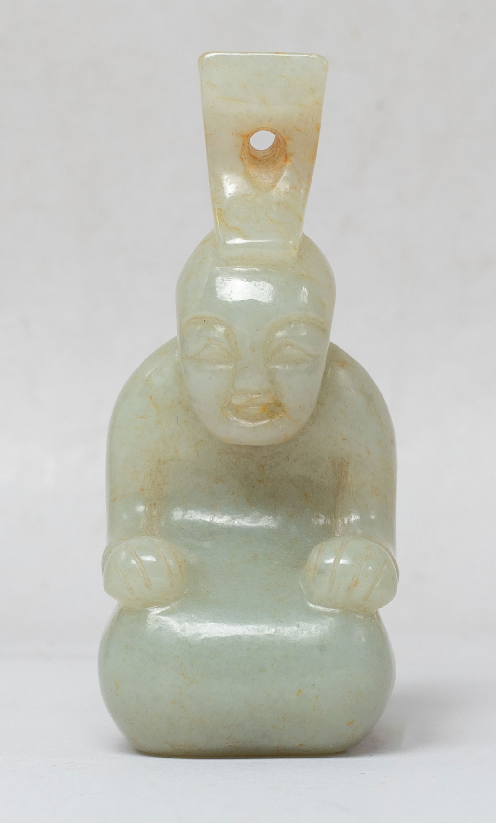 Collectible Chinese Jade Carved Pendant: Carved as a kneeling figure, the hands resting on knees, the stone of soft gray tone with russet inclusions, pierced with a circular aperture at the hair tuinga. Approx. 3.1*1.7*1.3 inch.