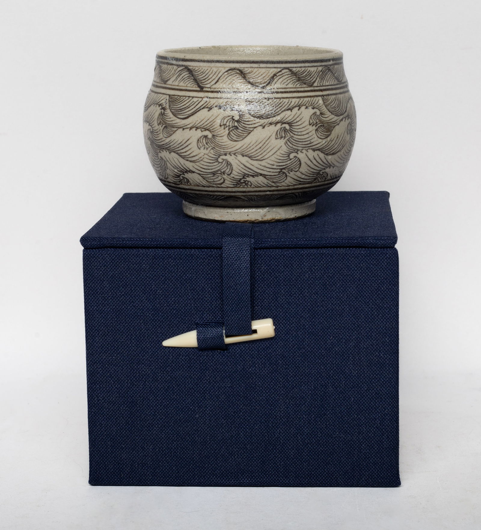 Chinese Cizhou Ware Porcelain Jar: The bulbous jar exterior painted with waves pattern, with box. Approx. 3*2.4 inch (w/o box).