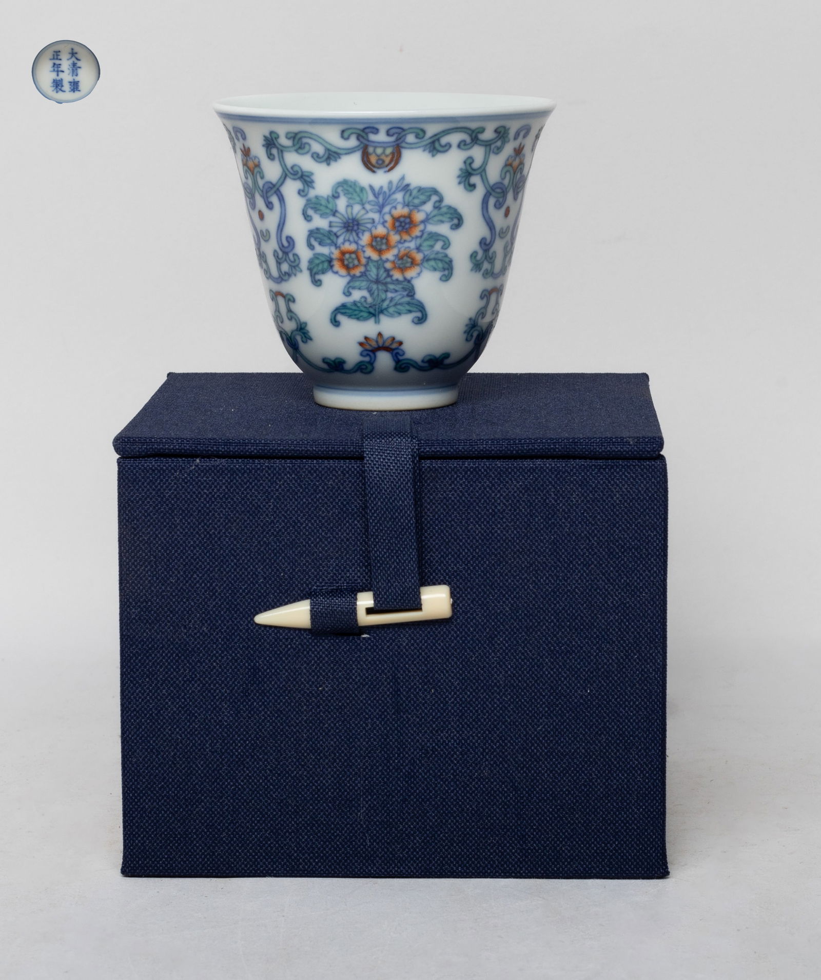 Estate Chinese Export Porcelain Tea Cup: The cup exterior decorated with delicate floral motif, the bottom marked with six characters enclosed in double circles, with box. Approx. 2.8*2.5 inch (cup size).