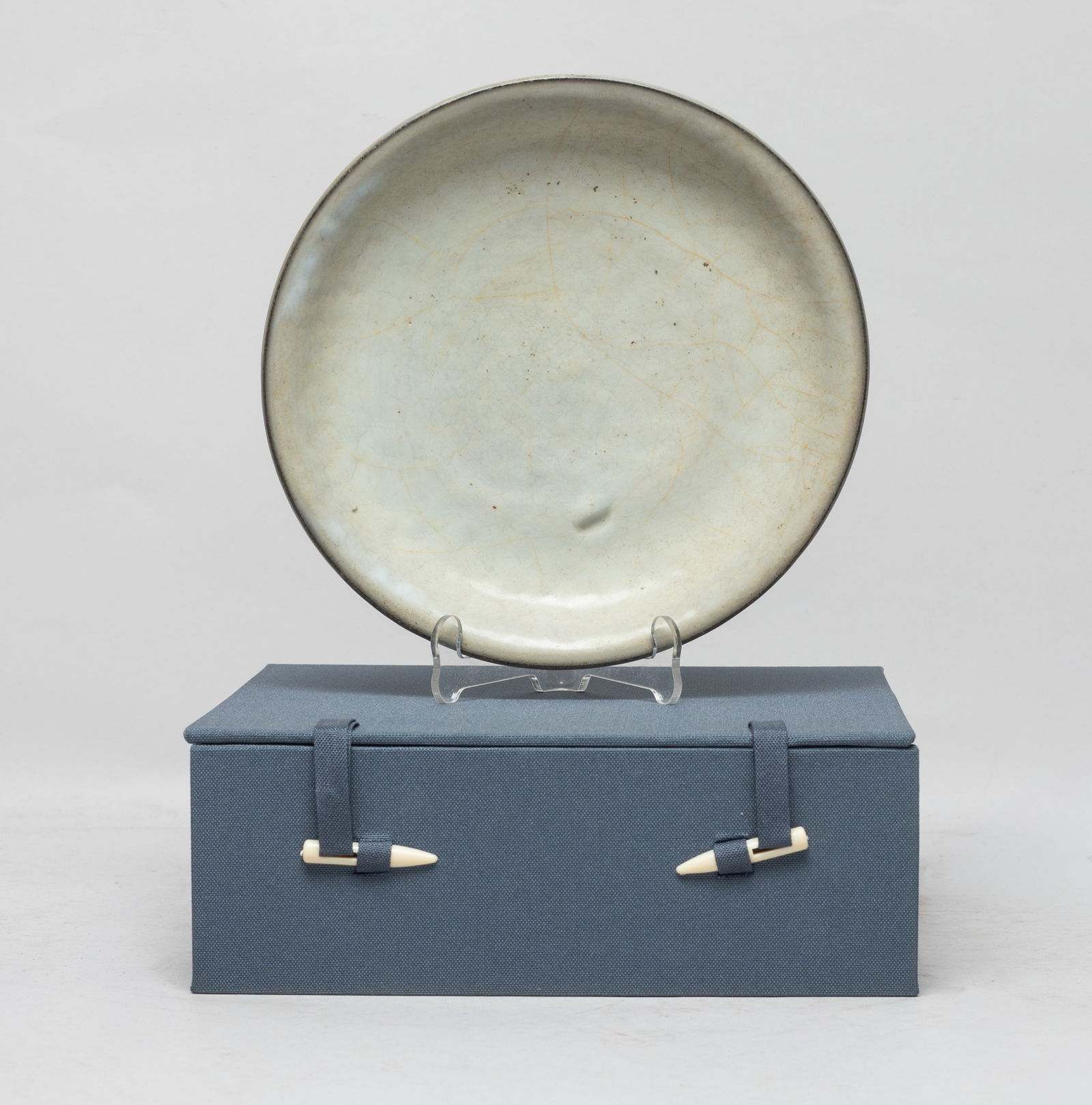 Chinese Guan Type Porcelain Bowl: The plate overall covered with mottled soft gray glaze, with soft brown crackles, with box. Approx. 7 inch D (plate size).