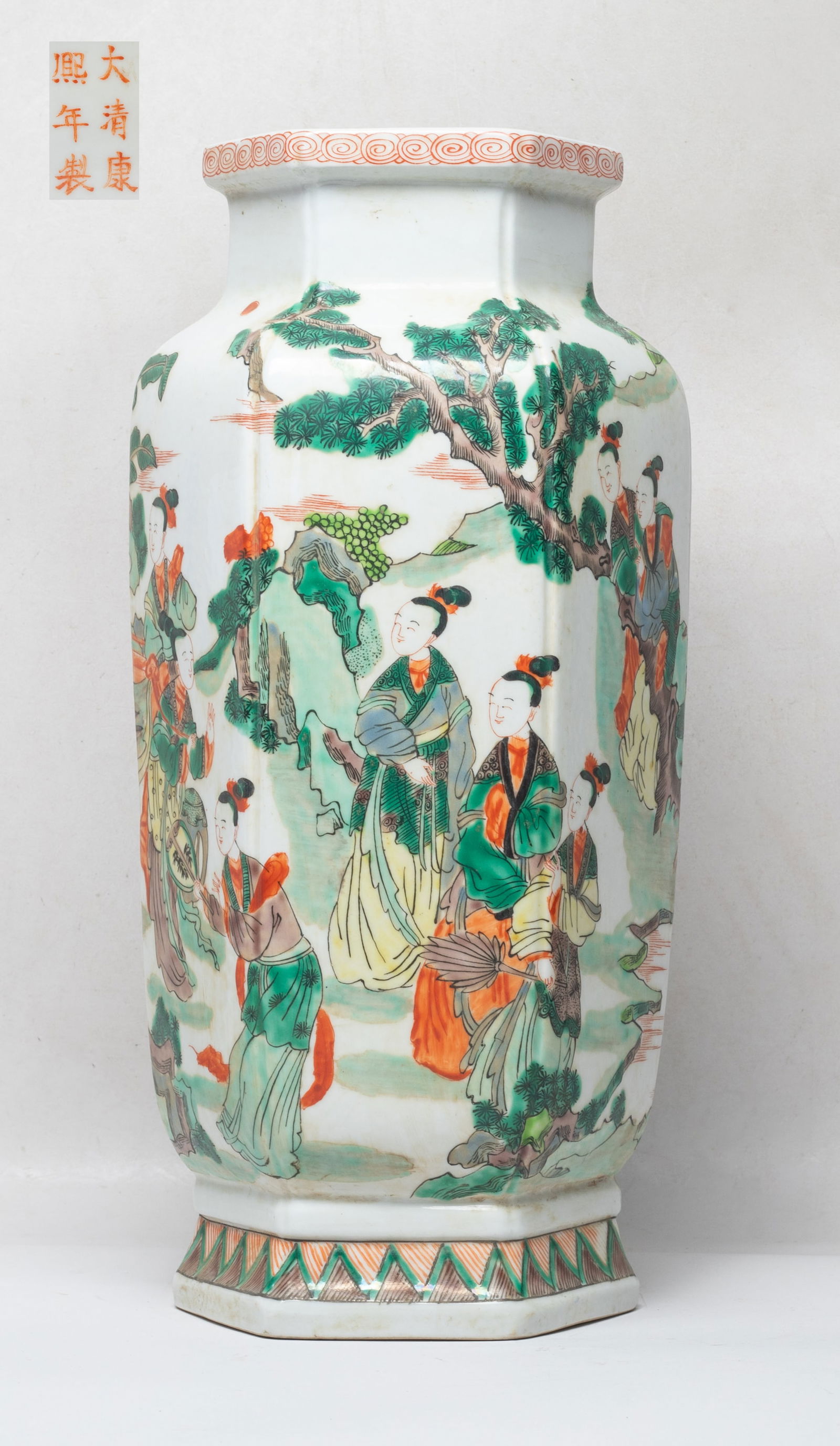 Tall Chinese Export Famille Rose Porcelain Vase: Of hexagonal section, the tall body painted with ladies in various activities in garden setting, the bottom marked with six characters in copper red glaze. Approx. 14.8*6.5 inch.