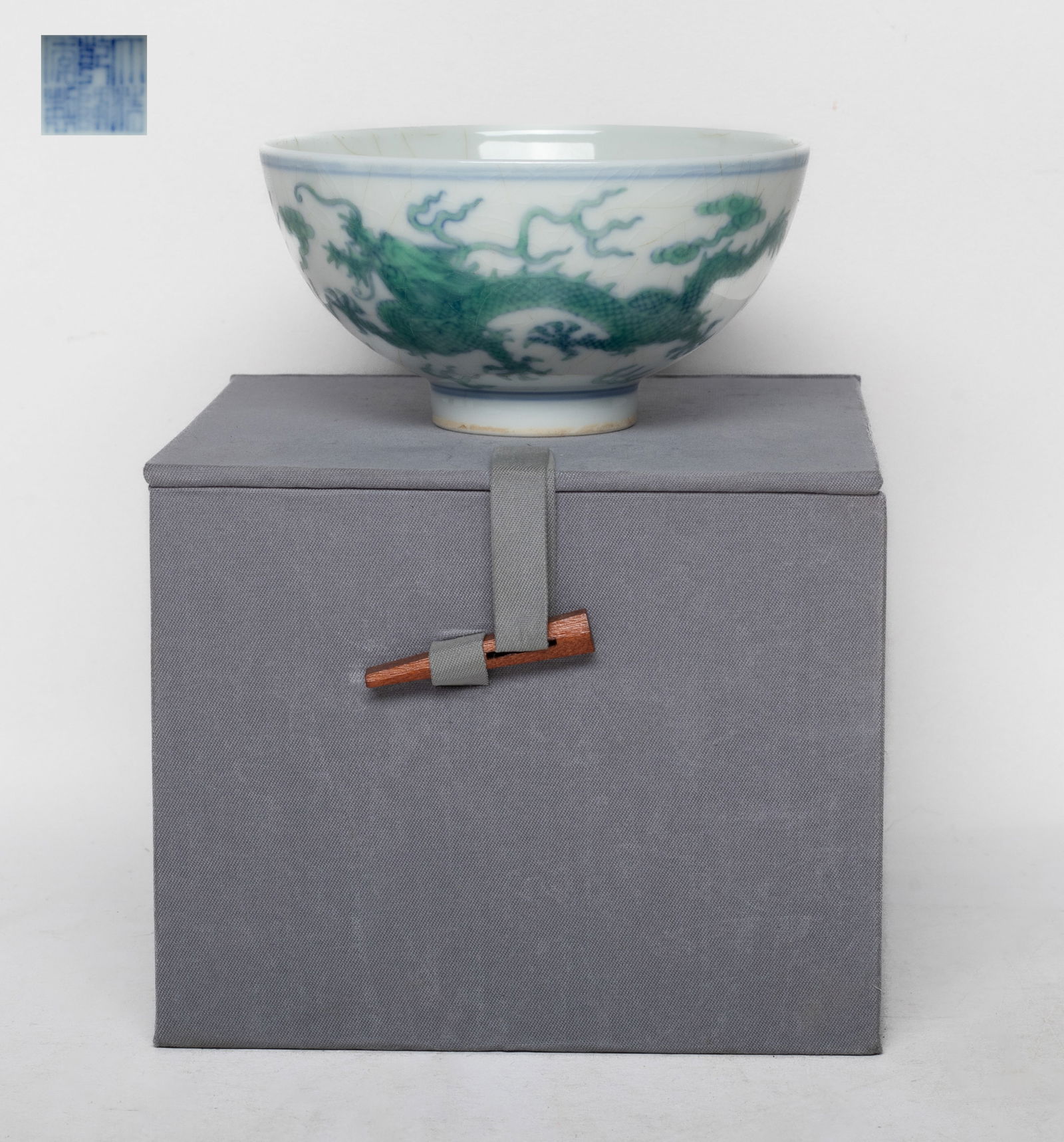 Chinese Douchai Porcelain Soup Bowl: The bowl exterior decorated with two green color dragons pursuing flaming pearls amidst flames and clouds, the bottom with a six-character mark, with box. Approx. 4*2 inch (bowl size).