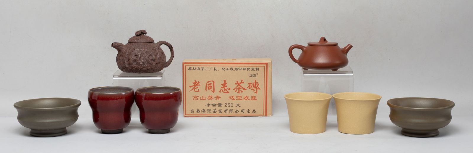 Chinese Zisha Clay Tea Wares, Tea Brick: Including two Chinese small zisha clay tea pots, six tea cups, and a tea brick. Size varies.