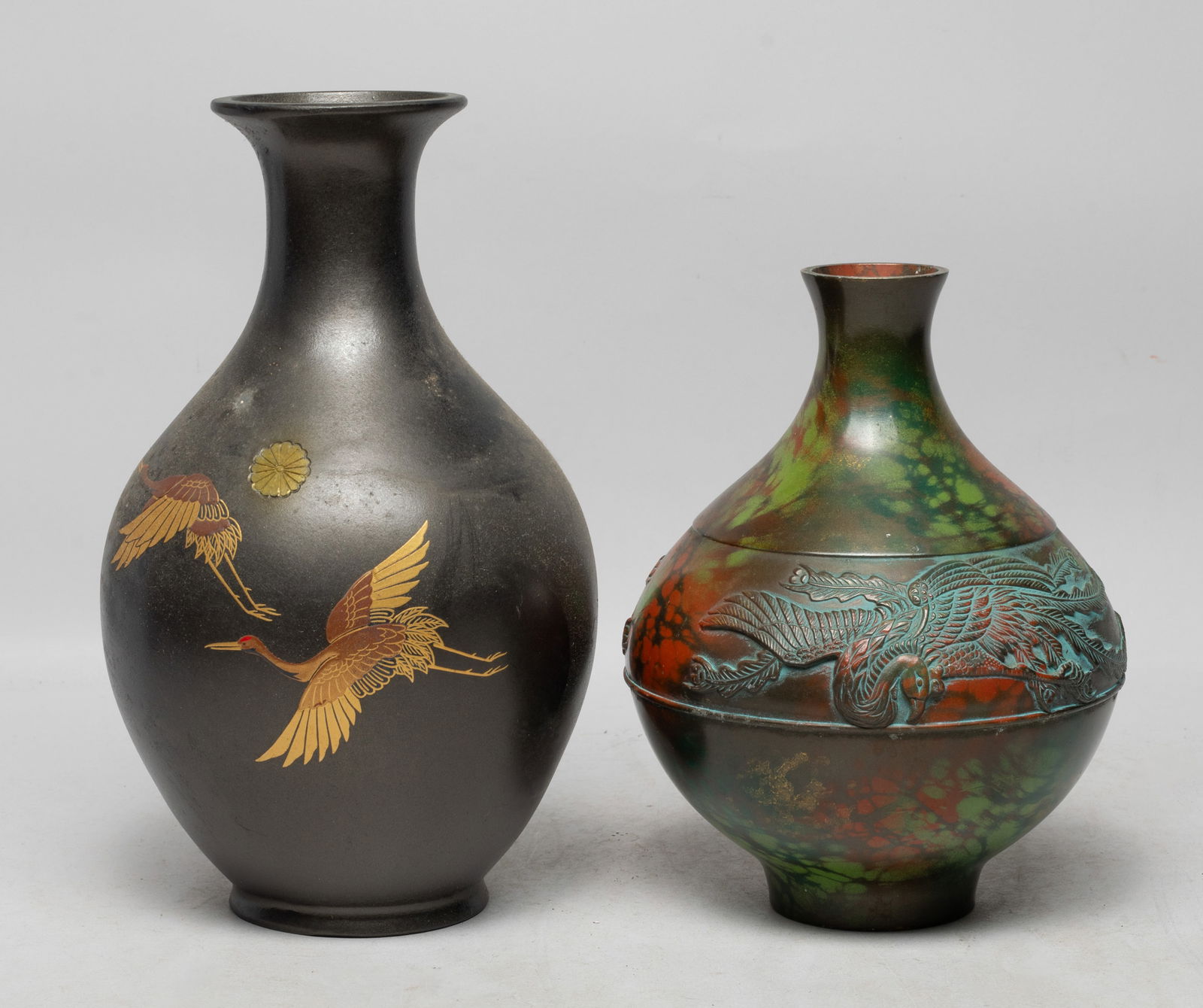 Two Vintage Japanese Metal House Decor Vases: Two vintage Japanese room decor metal vases, carved with flying crane or phoenix. Approx. 9.5*5.7 inch (larger).