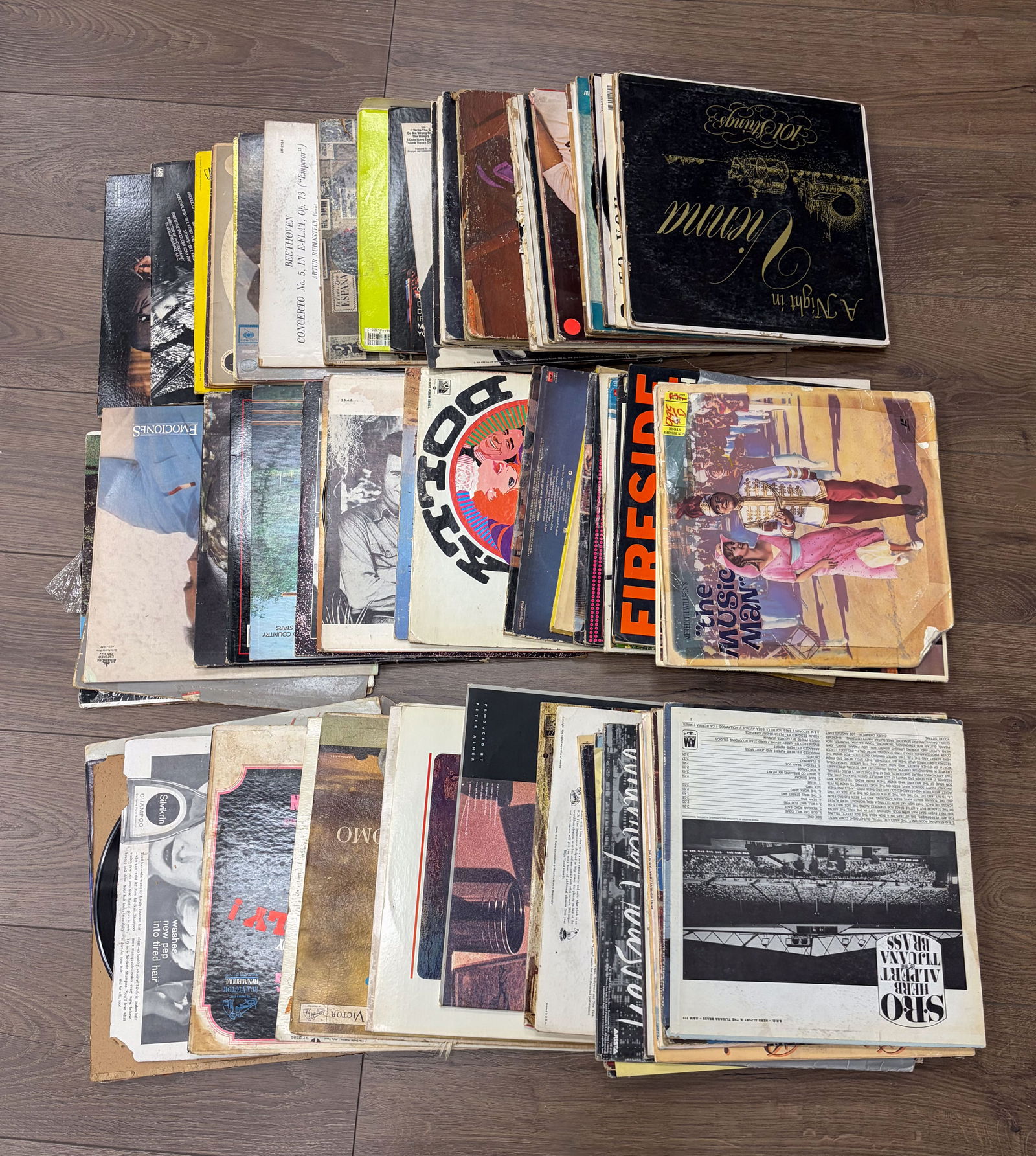 Estate Group of Vintage Records: Large set of vintage records. Some of the items may not include the actual records. Size varies.