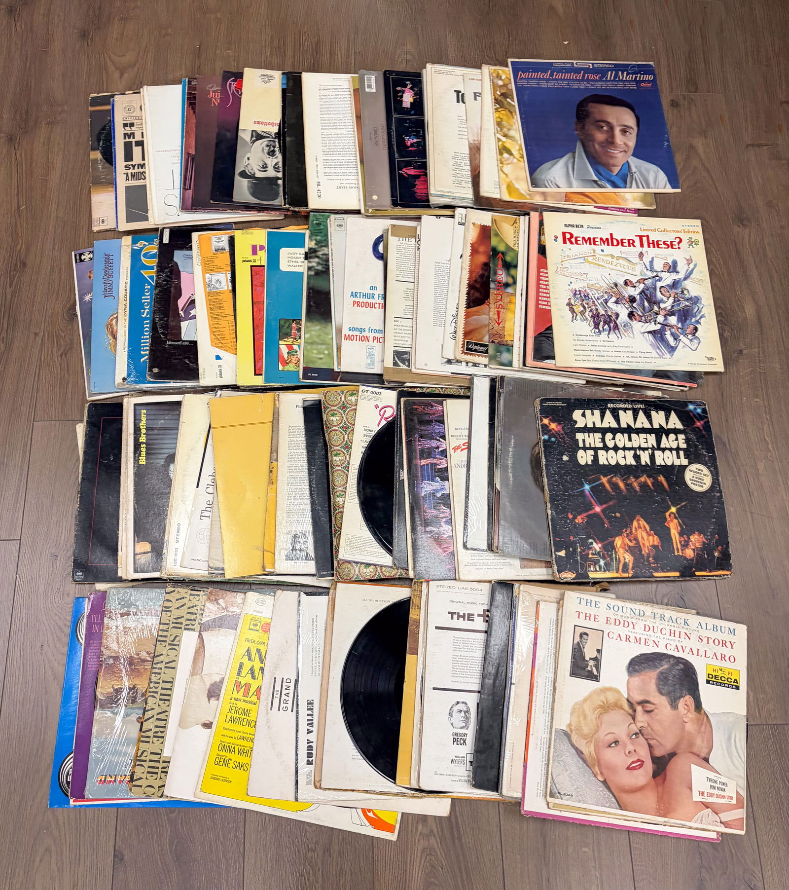 Estate Set Vintage Records: Large set of vintage records. Some of the items may not include the actual records. Size varies.