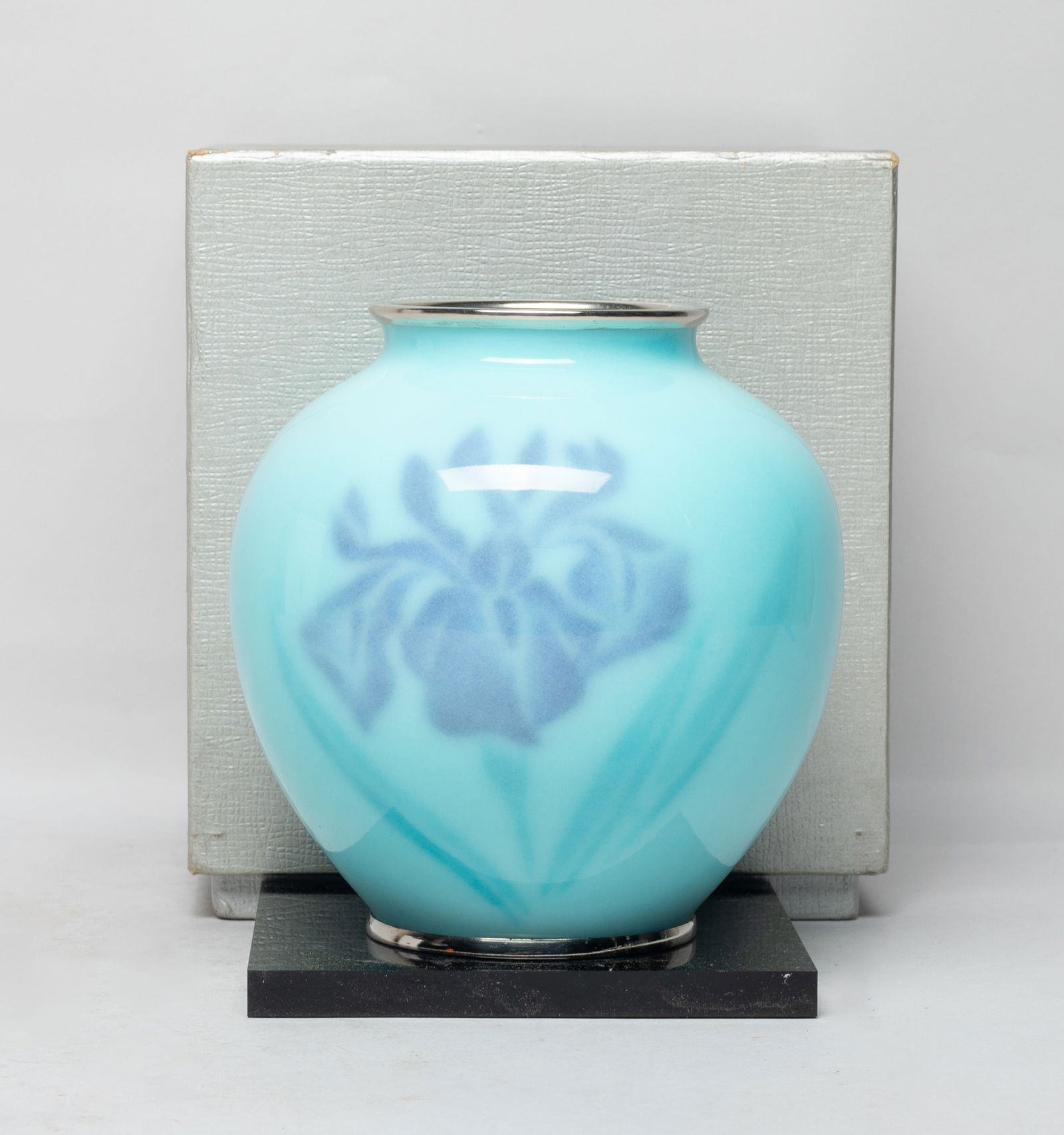 Vintage Japanese Cloisonne Vase: Japanese cloisonne vase of ovoid shape, the exterior decorated with purple flower on sky blue body, with base and box. Approx. 5.4*5.2 inch (vase size). The Estate of the J & J Found, AZ, 2021.