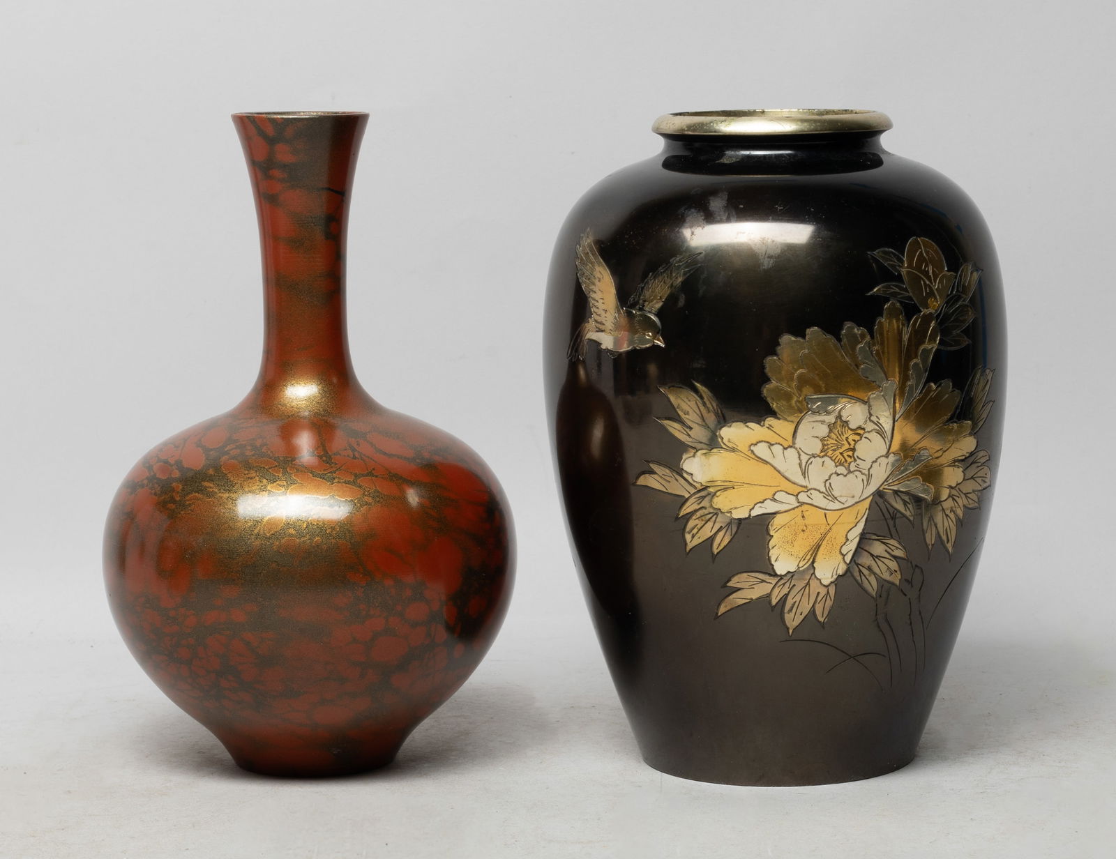 Two Vintage Asian Metal House Decor Vases: Two vintage Asian metal house decor vases, the larger vase body carved with bird and flower. Approx. 8.2*5.5 inch (larger).