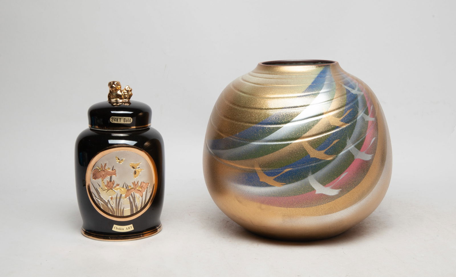 Vintage Japanese Painted Porcelain, Decor Vase: Two vintage Japanese porcelain vases, the Art of Chokin vase gilded with gold and silver and decorated with flowers and butterflies, the other vase painted with birds. Approx. 8.7*8 inch (larger).