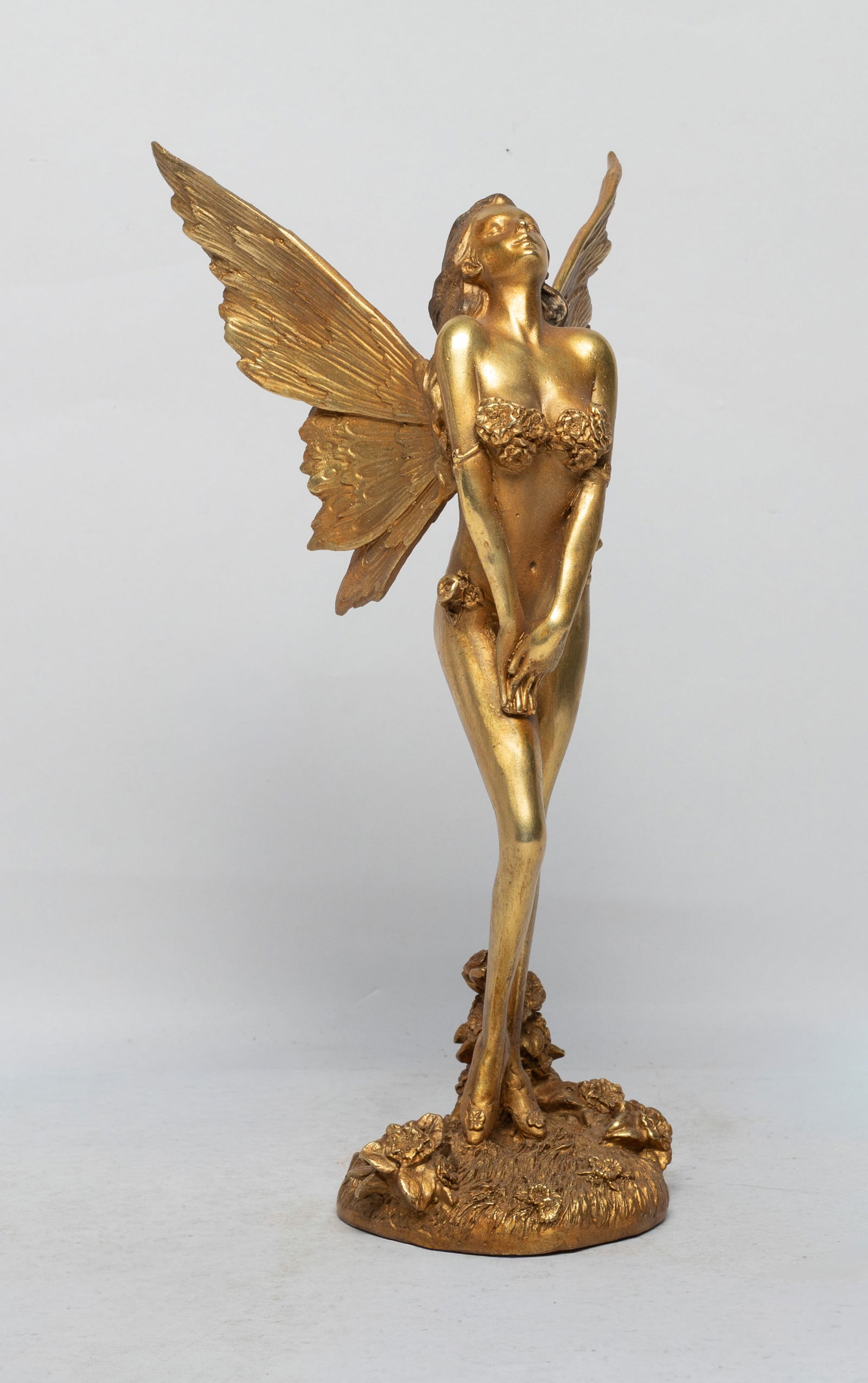 Estate Vintage Gilt Bronze Sculpture: The gilt bronze sculpture cast as a standing beautiful woman with wings outstretched, the base detailed with flowers. Approx. 10.5*5.5*5.1 inch. The Estate of the E Los Angeles, 2023.