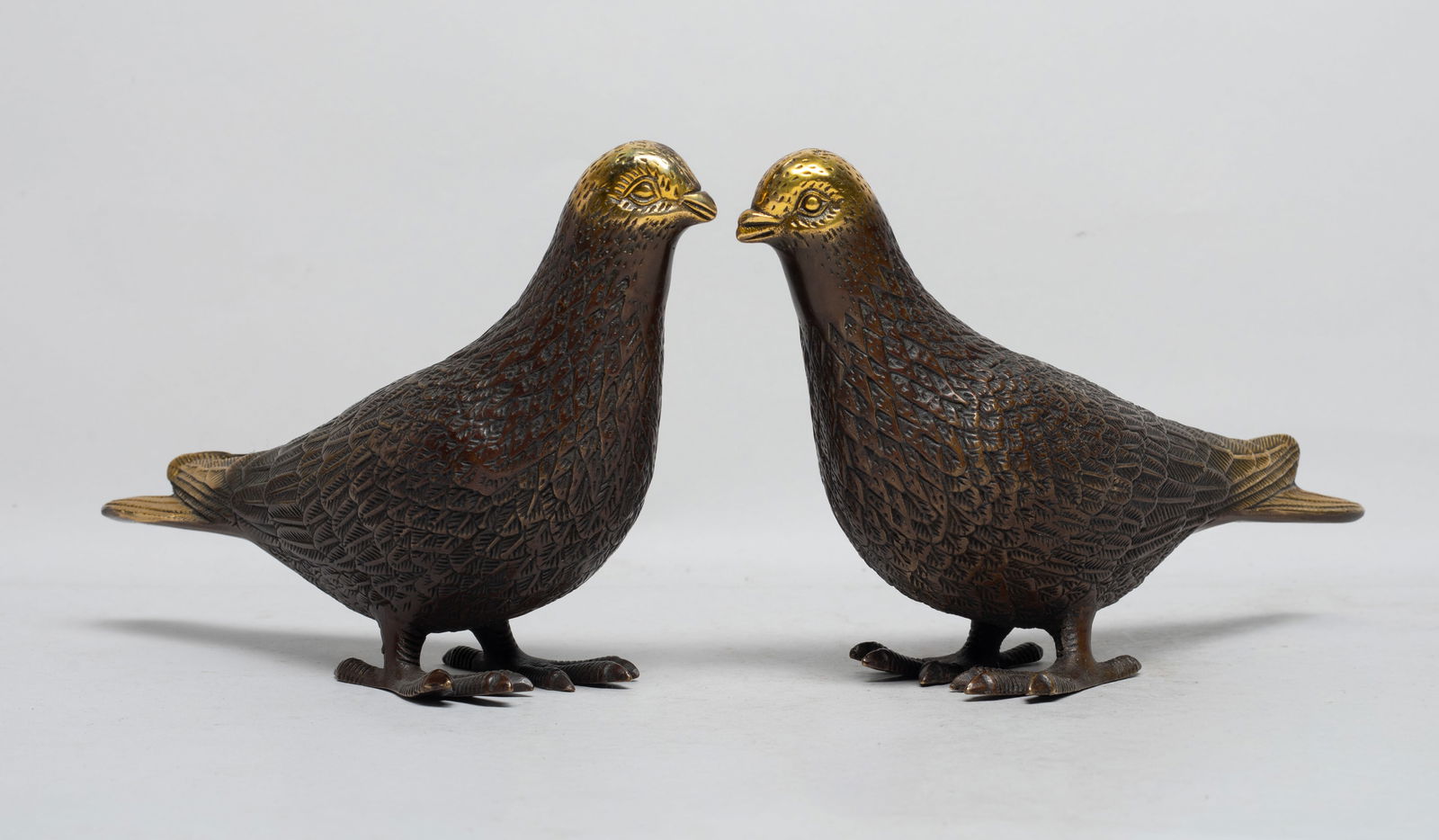 Two Vintage Gilt Bronze Sculptures: Two vintage gilt bronze table sculptures cast of bird form. Approx. 7.5*4.5*2.3 inch (each). The Estate of the E Los Angeles, 2023.
