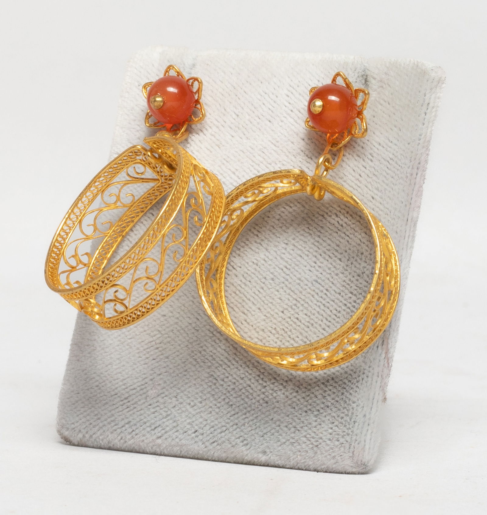 Pair Chinese Gold on Sterling Silver Earrings: A pair of designed gold on sterling silver earrings with beads, reticulated with scroll motif. Approx. 6 gram (total weight). The Estate of Store Moving Sale, Downtown Los Angeles. 2025.