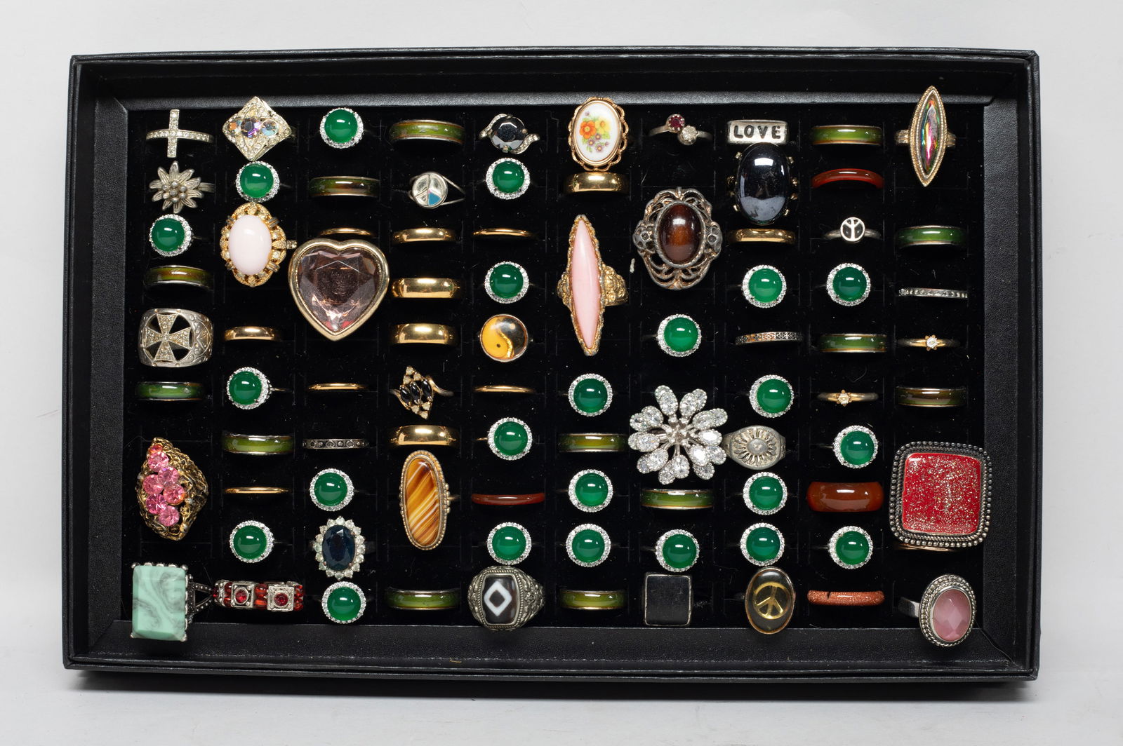 Estate Large Set Rings Collection: Large set of designed rings, some inlaid with stone, with tray. Size varies.